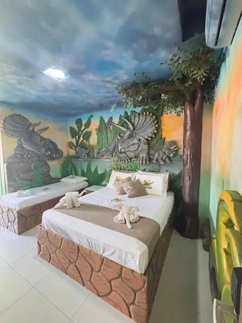Bed in Hotel Recanto dos Dinossauros