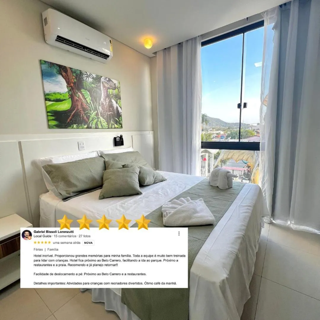 Bed in Hotel Recanto dos Dinossauros