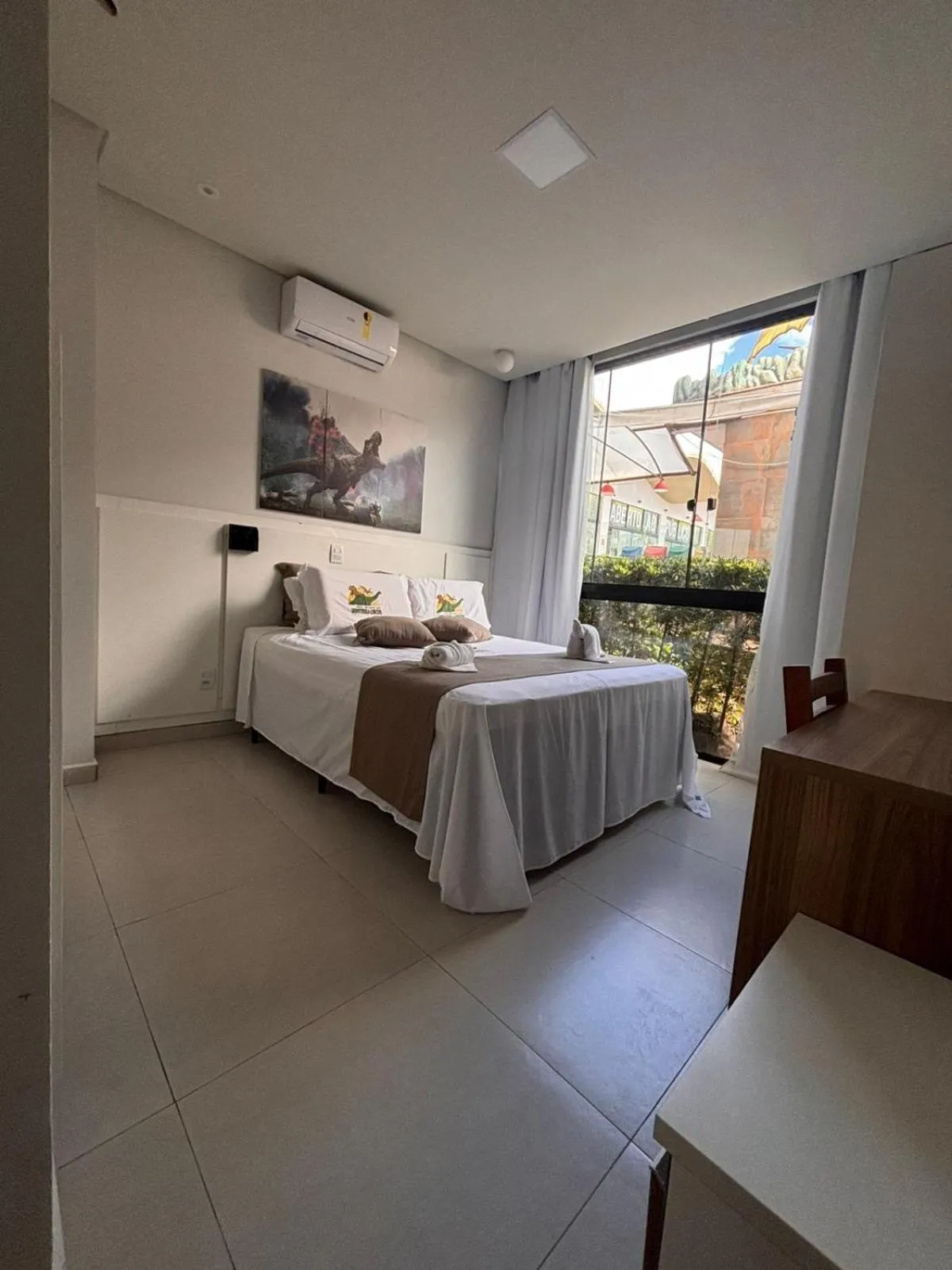 Bed in Hotel Recanto dos Dinossauros