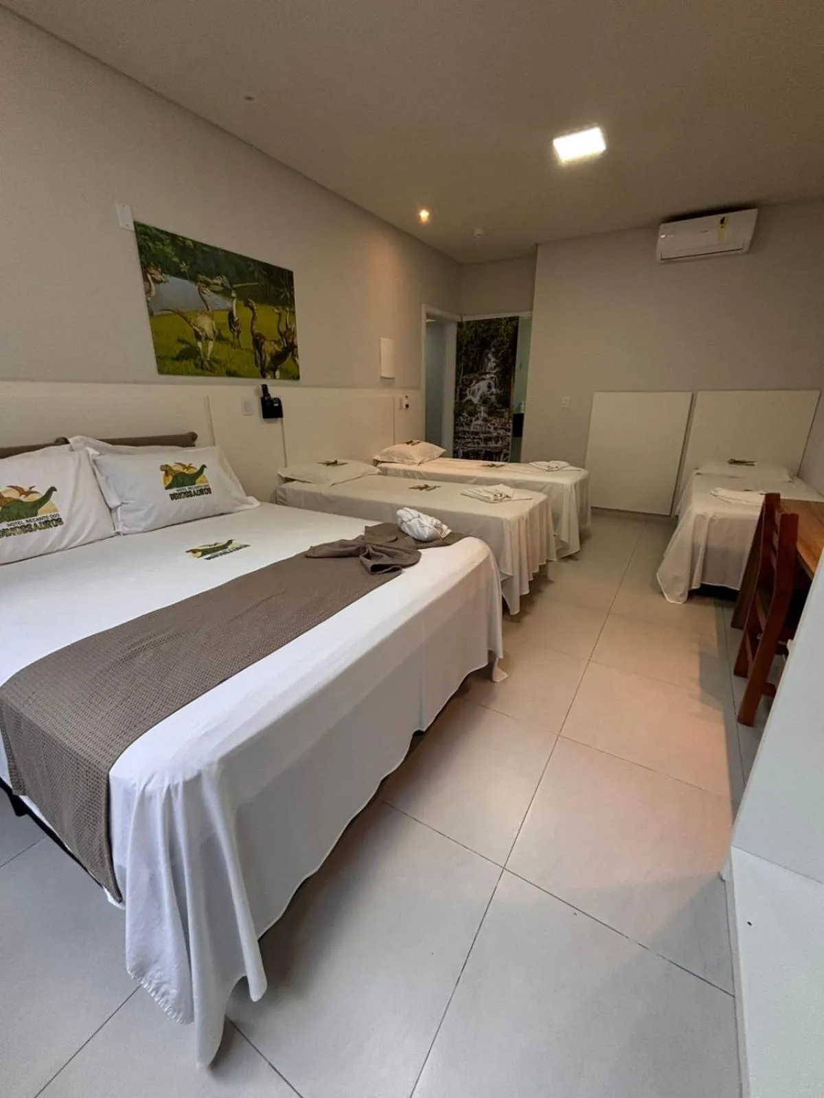 Bed in Hotel Recanto dos Dinossauros