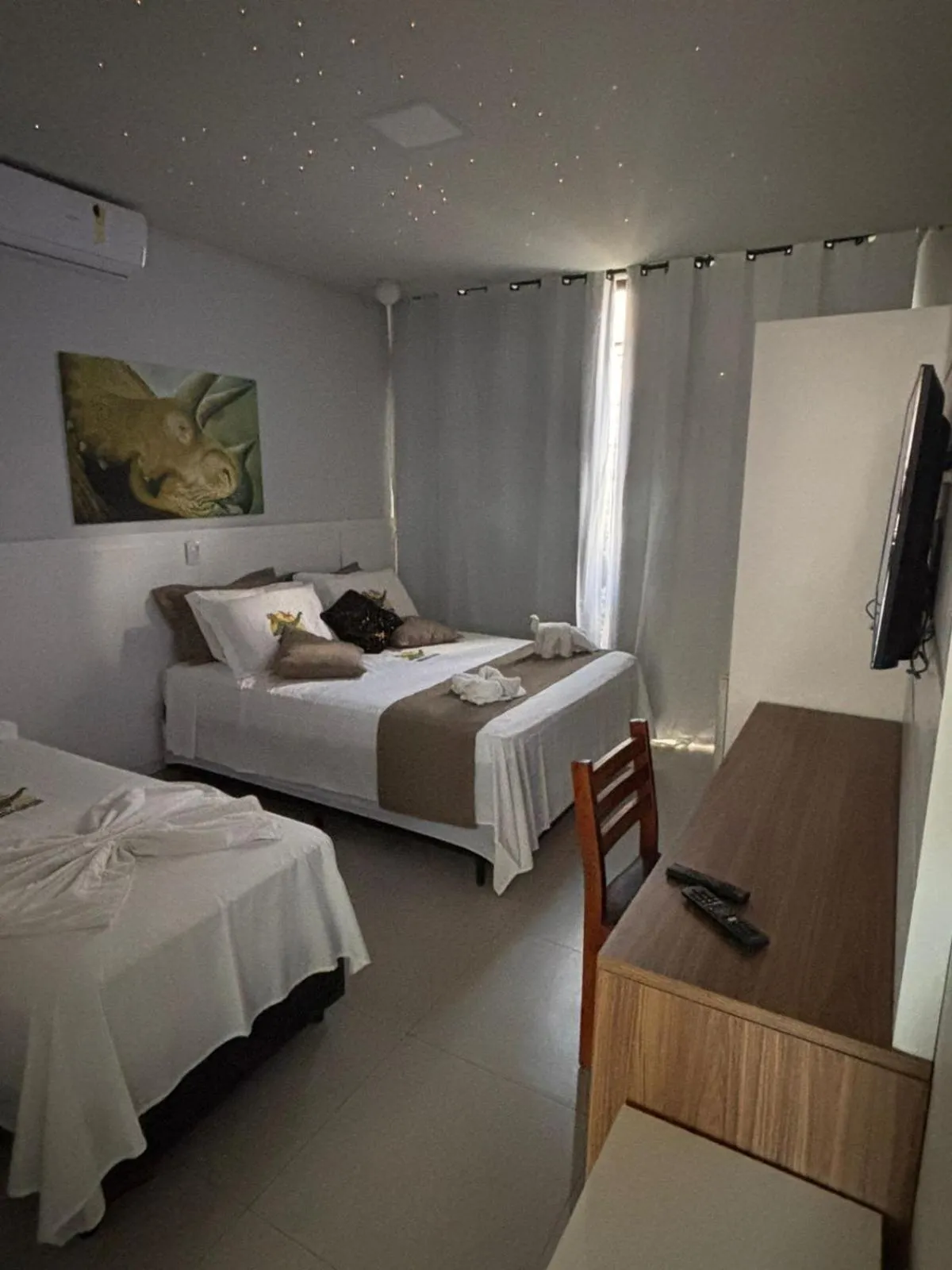 Bed in Hotel Recanto dos Dinossauros