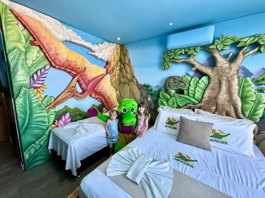 Bed in Hotel Recanto dos Dinossauros