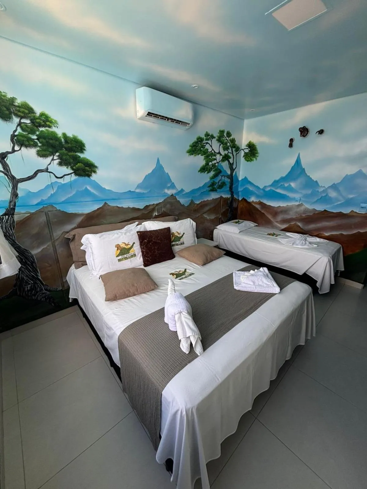 Bed in Hotel Recanto dos Dinossauros