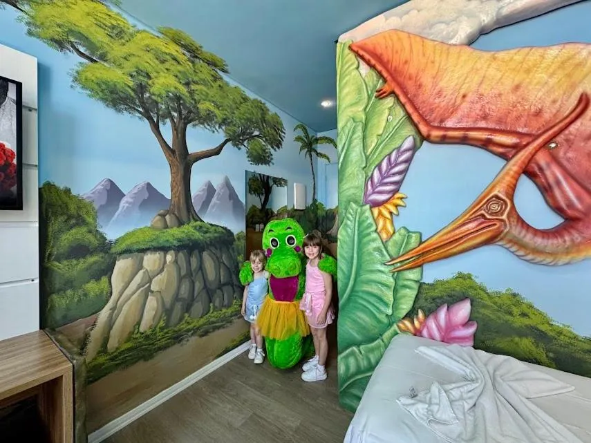 Bed in Hotel Recanto dos Dinossauros