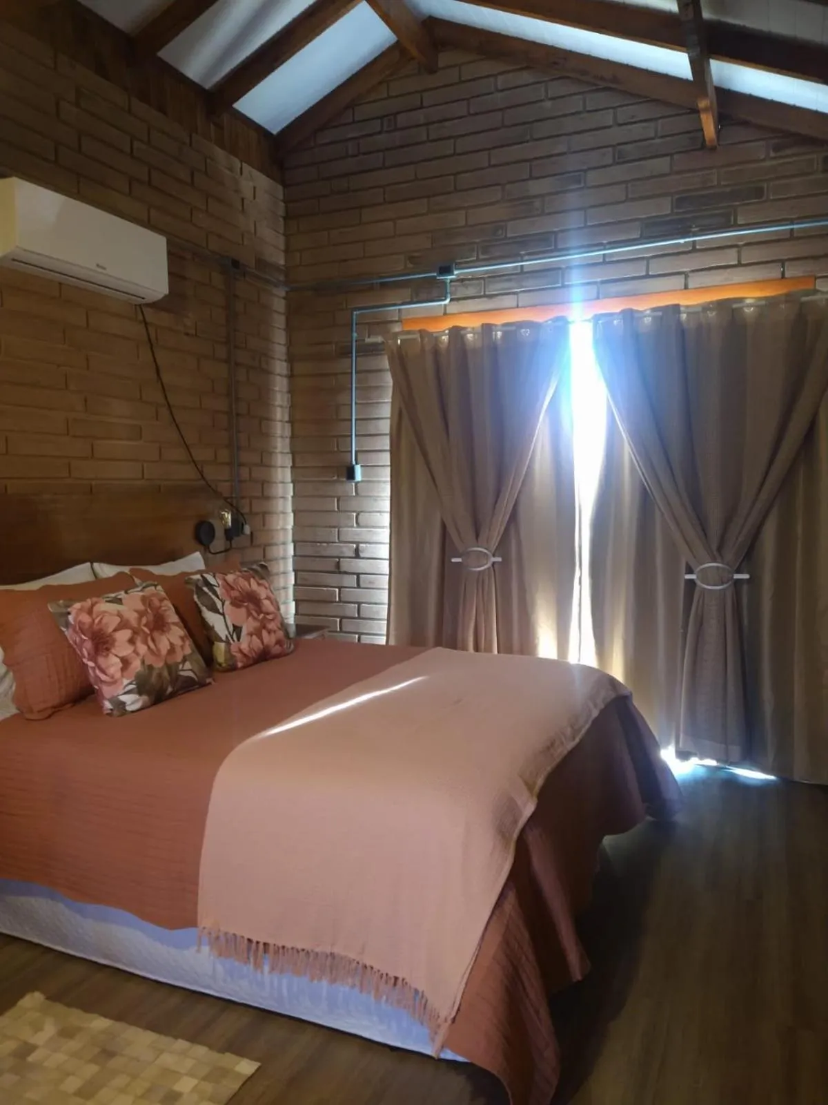 Bed in Chalés Corucacas