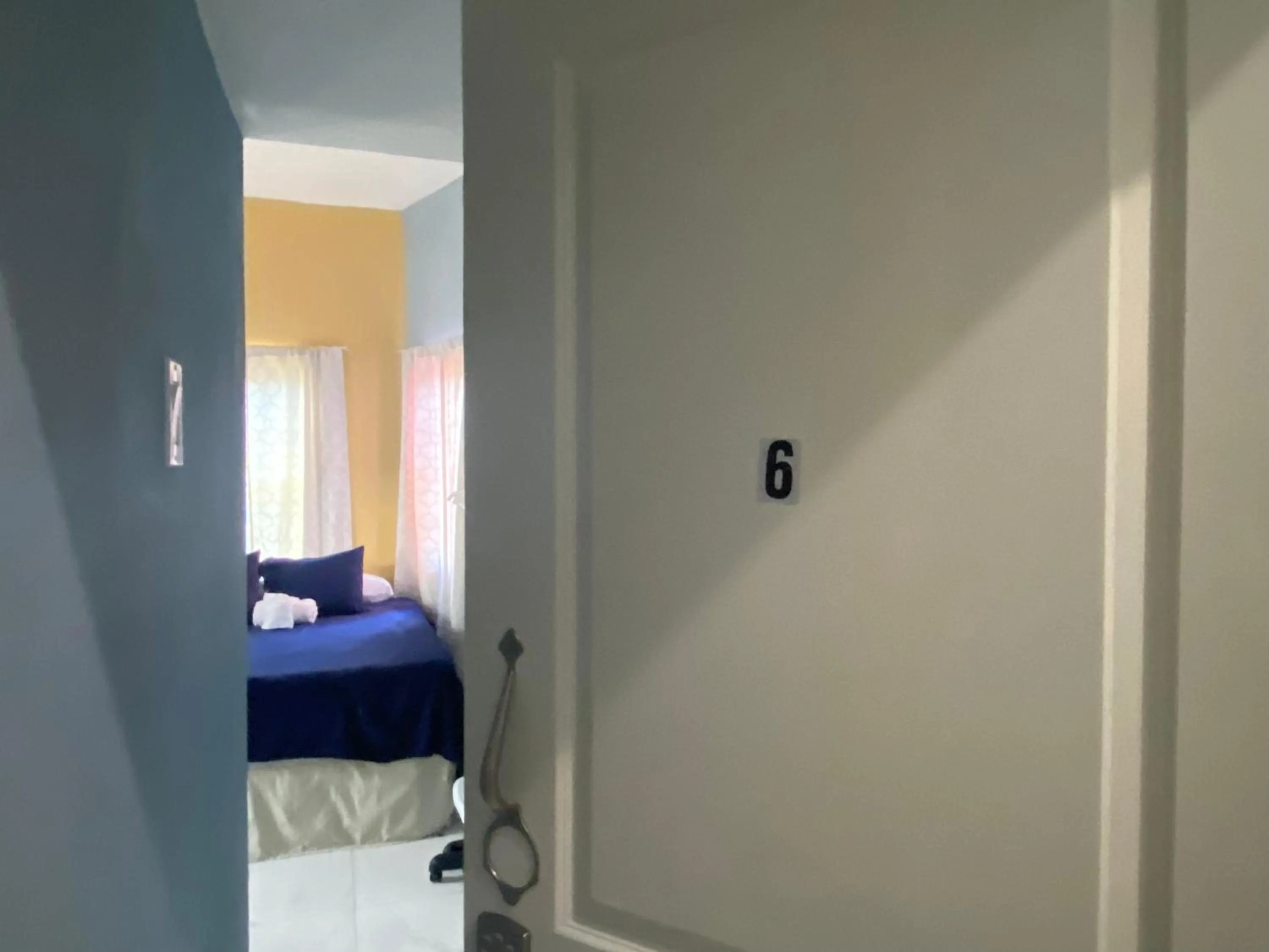 Bed in A taste of Jamaica Lavern’s Place