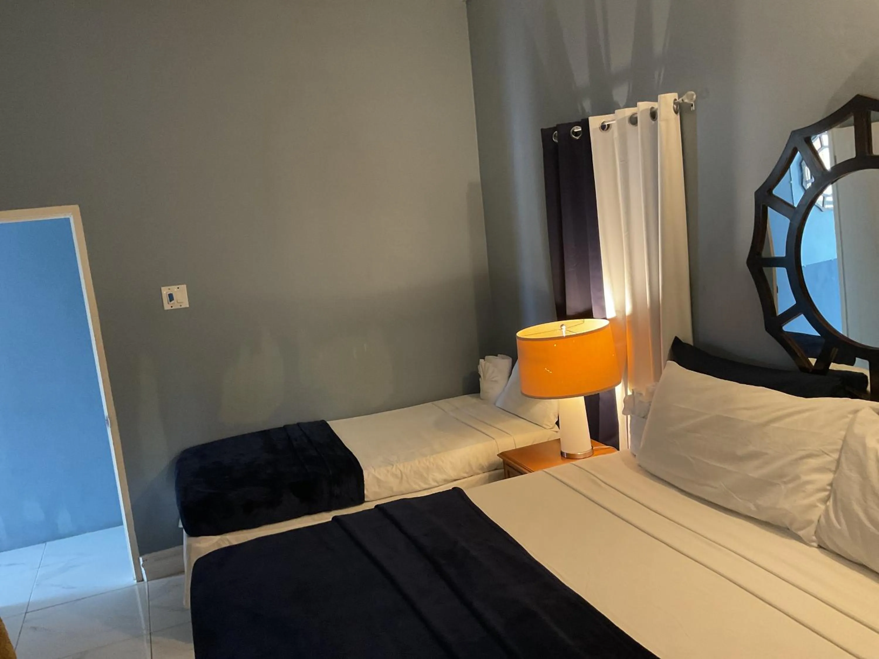 Bed in A taste of Jamaica Lavern’s Place