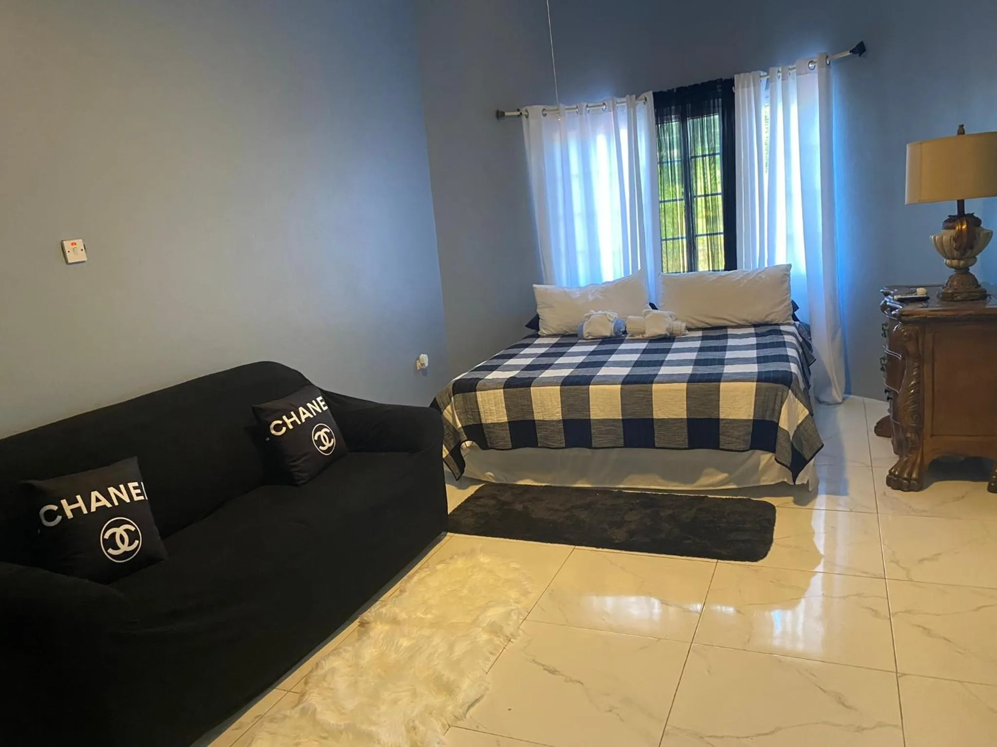 Bed in A taste of Jamaica Lavern’s Place