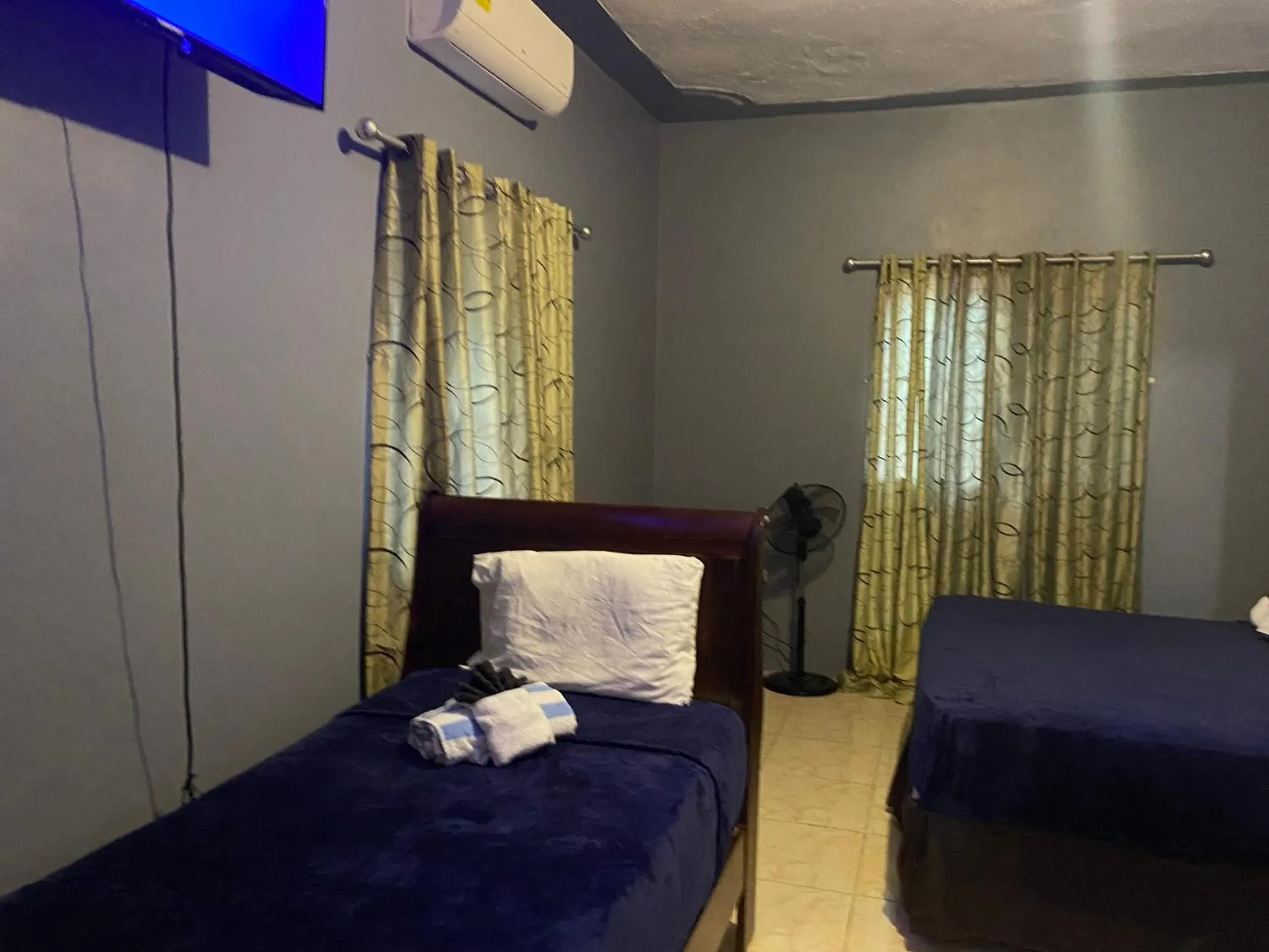 Bed in A taste of Jamaica Lavern’s Place