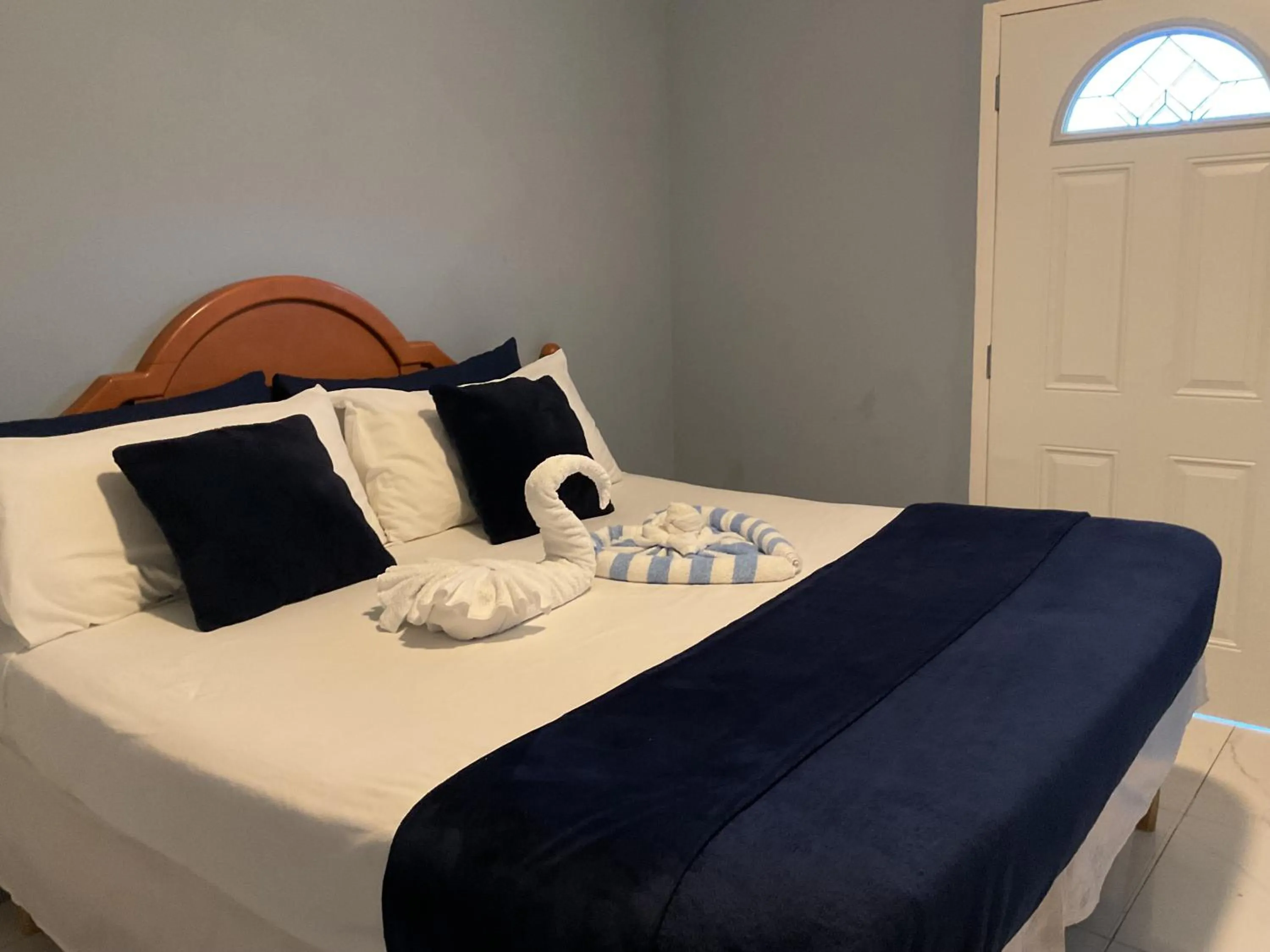 Bed in A taste of Jamaica Lavern’s Place