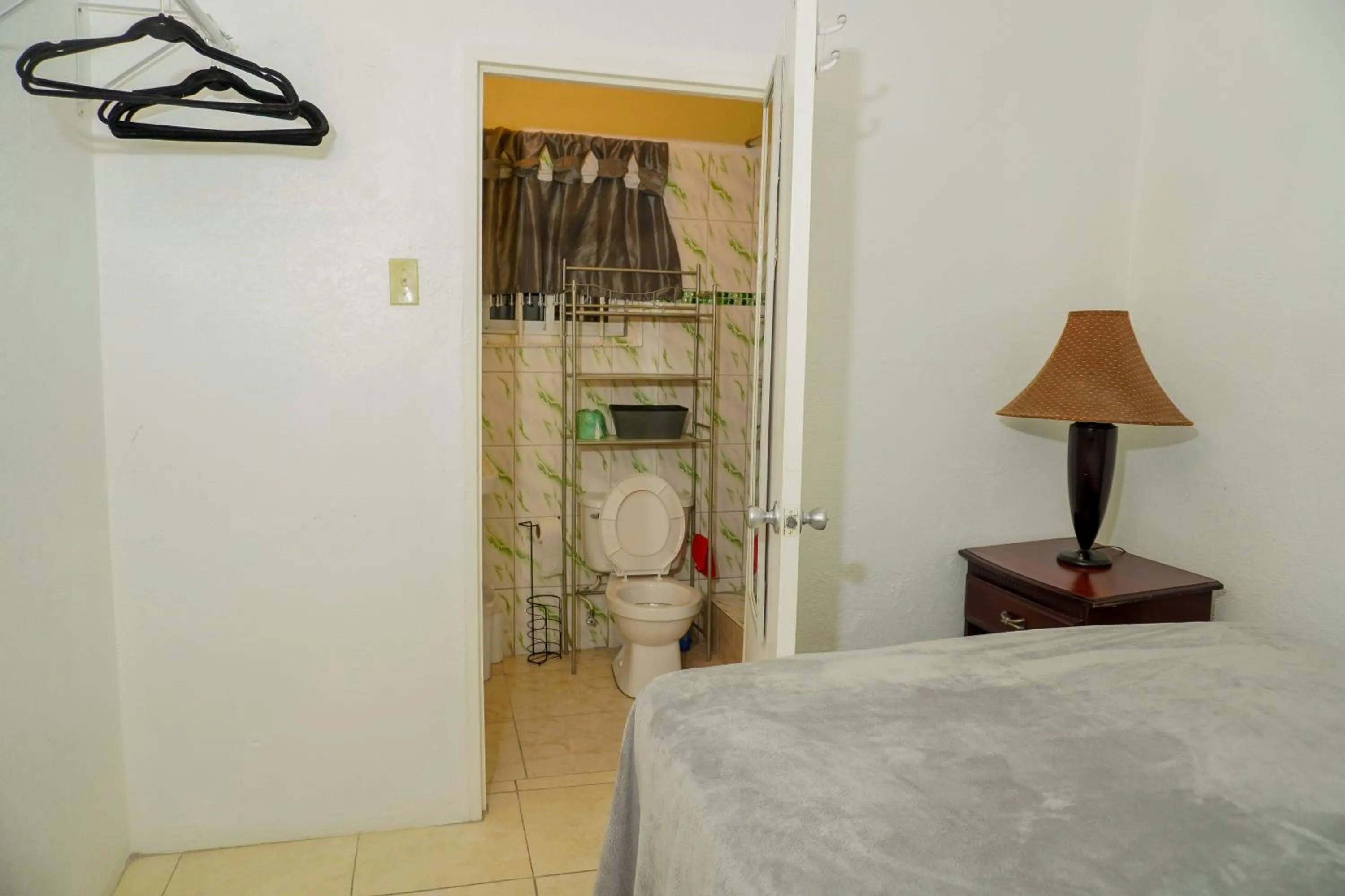 Bed in A taste of Jamaica Lavern’s Place