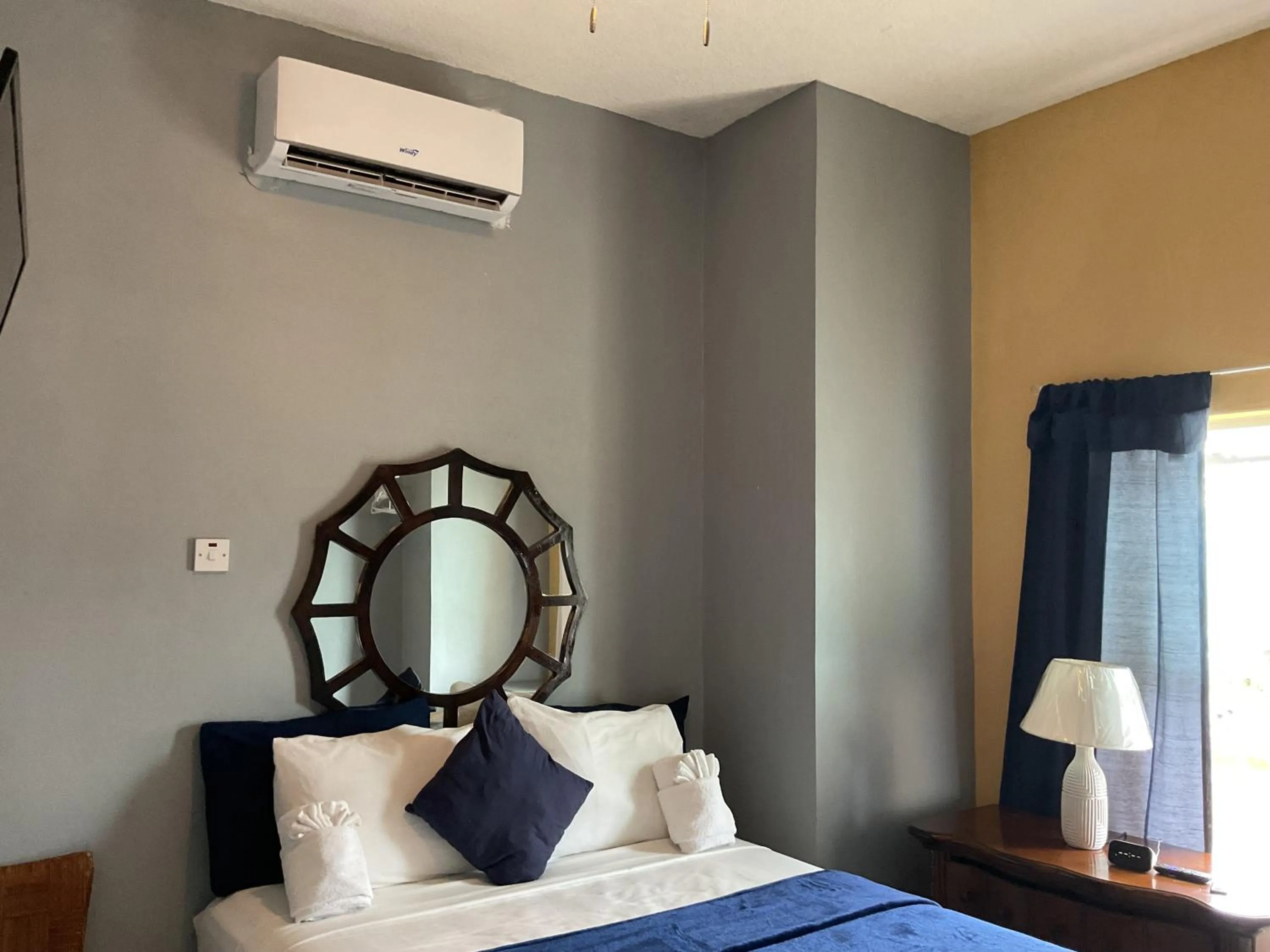 Bed in A taste of Jamaica Lavern’s Place