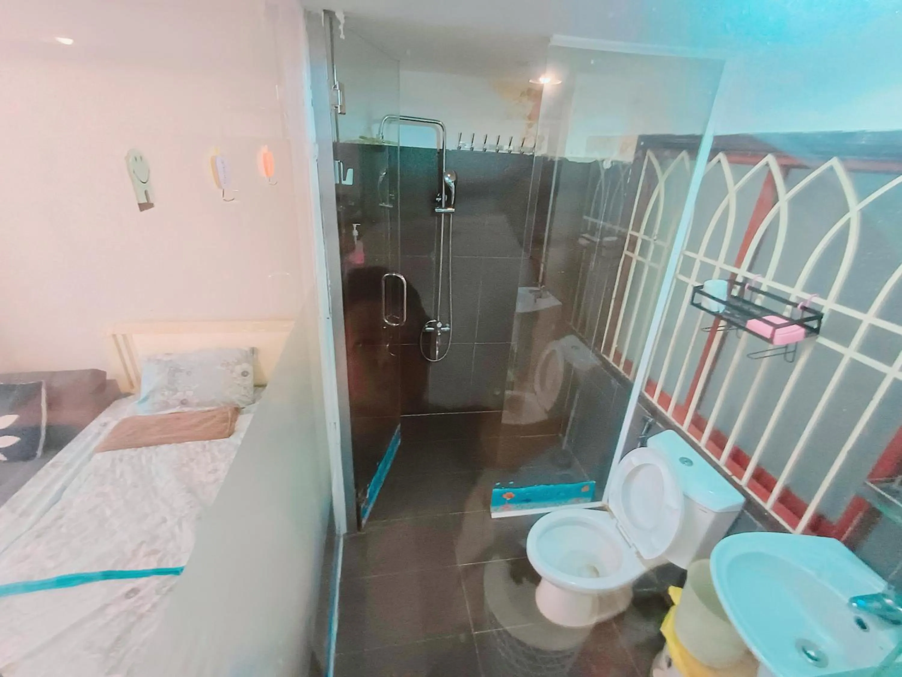 Shower, Bed in Homestay Hostel Apartment Minh Lộc