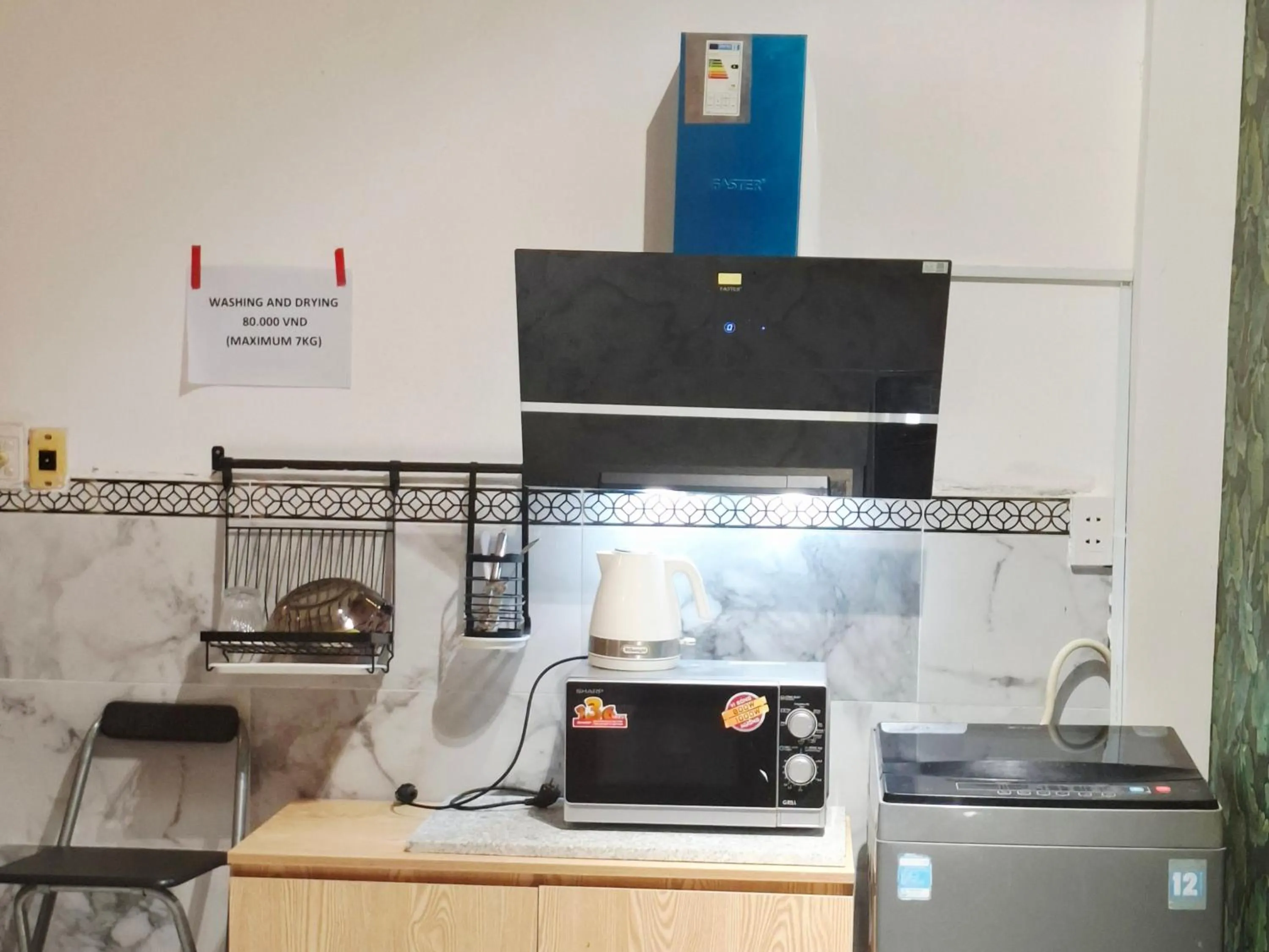 Kitchen or kitchenette in Homestay Hostel Apartment Minh Lộc