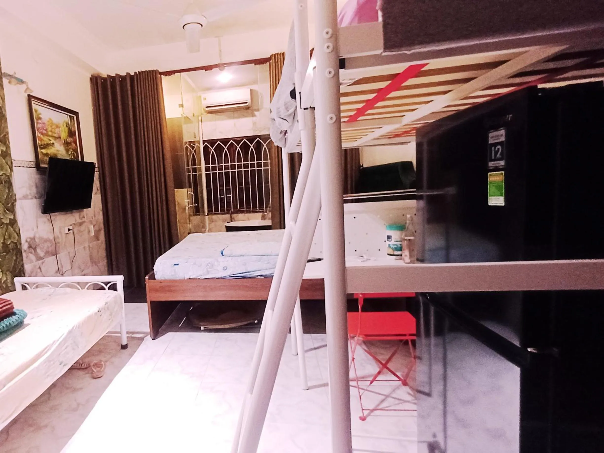 Toilet, Bed in Homestay Hostel Apartment Minh Lộc