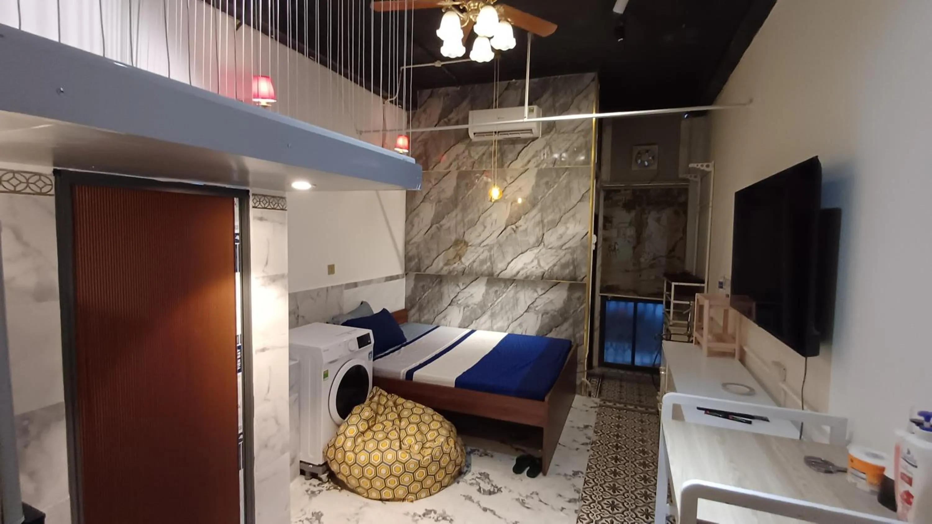 Communal lounge/ TV room, Bed in Homestay Hostel Apartment Minh Lộc