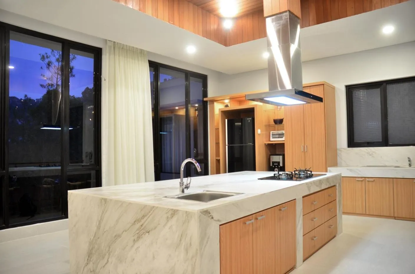 stove in Atsuka Hill View Villa 8 bedrooms with a private heated swimming pool