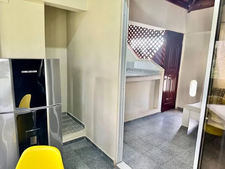 Kitchen or kitchenette, Bed in Hotel Turístico Marian