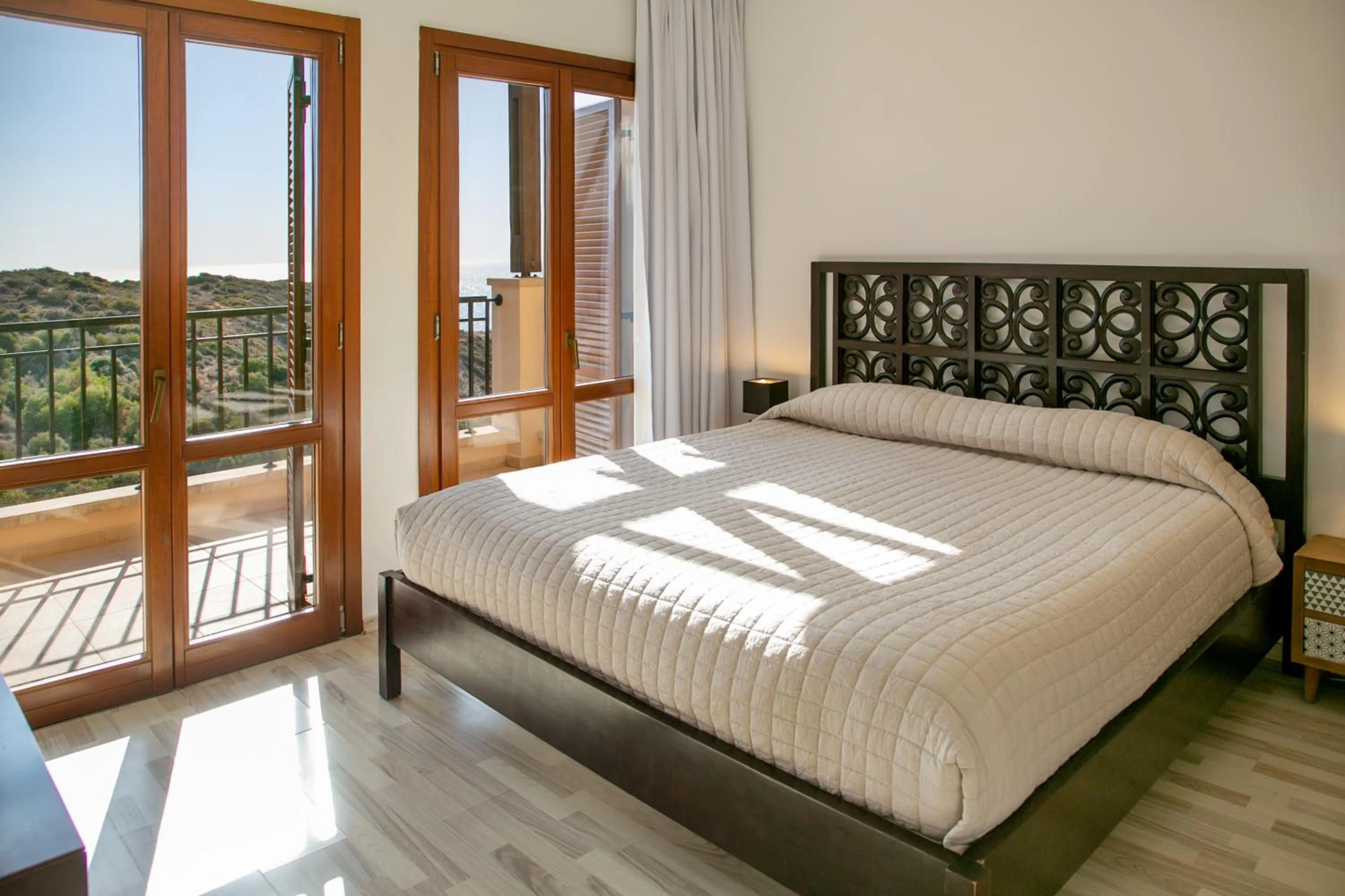 Photo of the whole room, Bed in Aphrodite Hills Rentals - Junior Villas