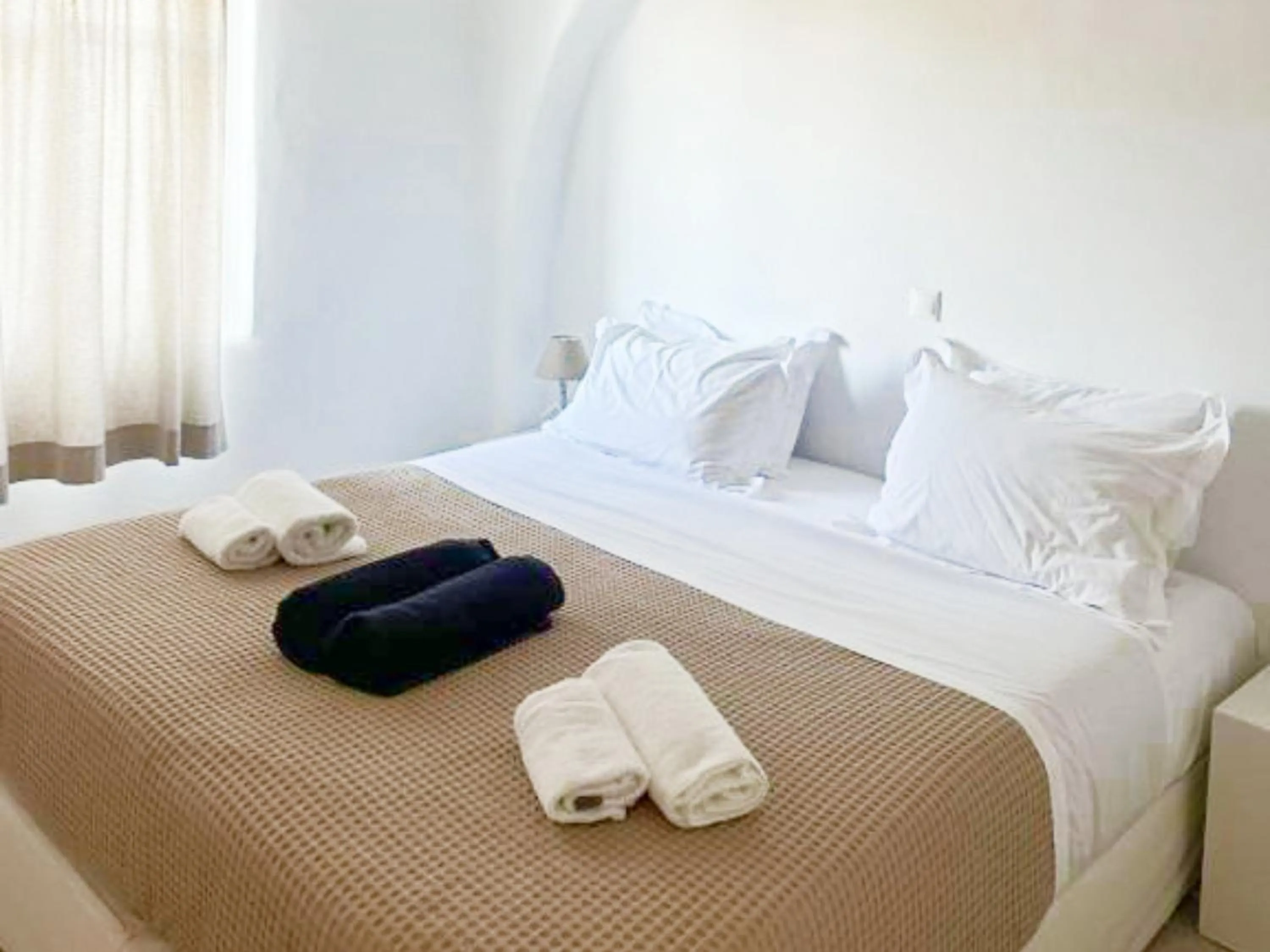 Bedroom in White Rock Suites & Villas