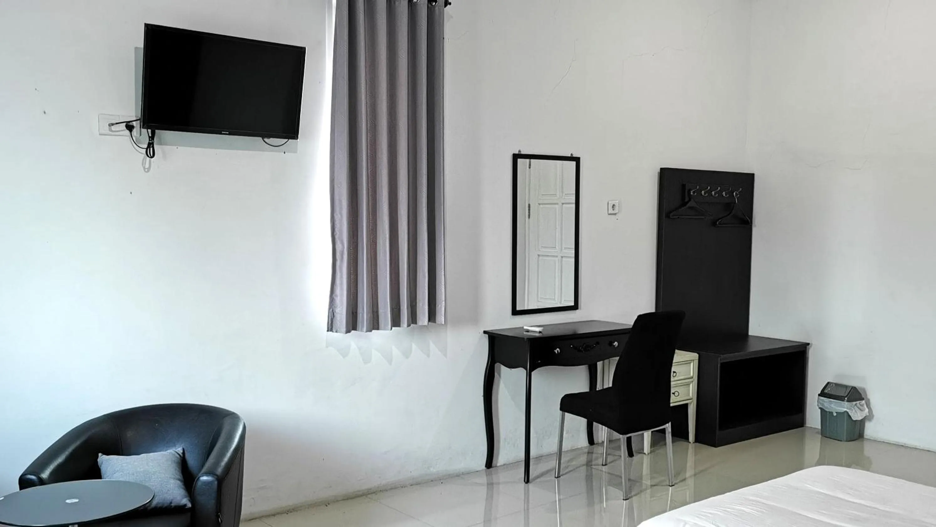 TV and multimedia in Hotel Aqiilah Syariah