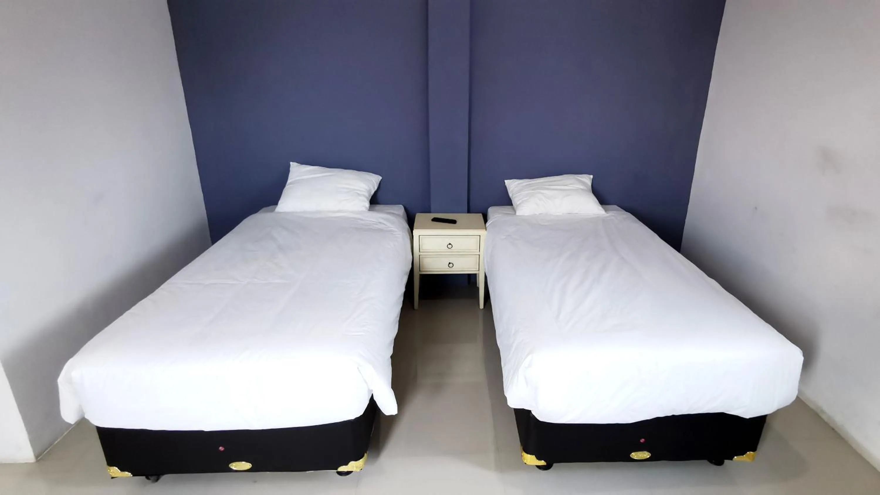 Bed in Hotel Aqiilah Syariah