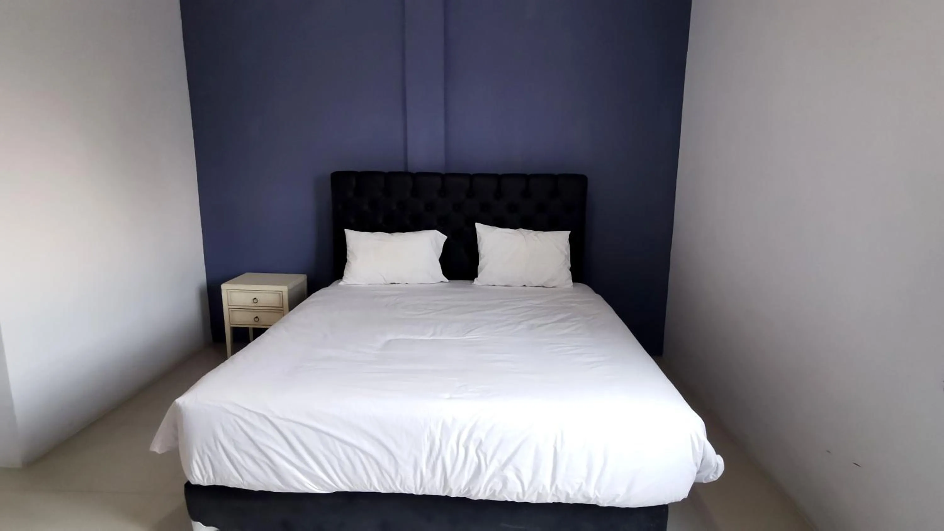 Bed in Hotel Aqiilah Syariah