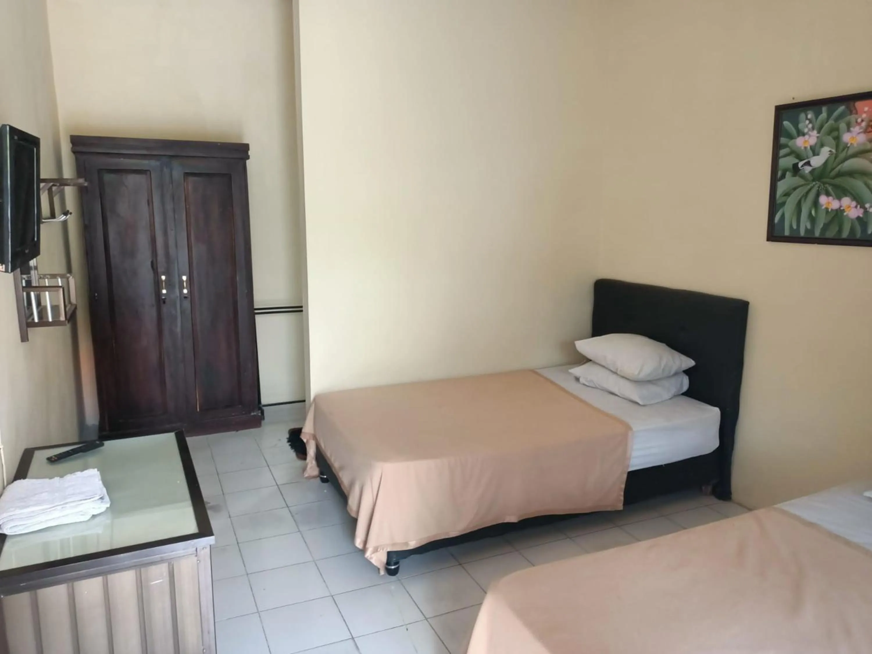 Bed in RedDoorz at Hotel Nuansa Ngawi