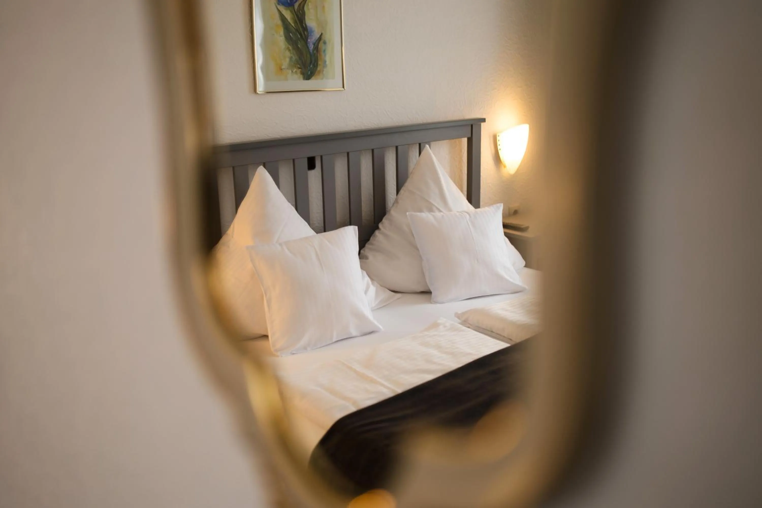 Bed in RATSKELLER Hotel & Restaurant