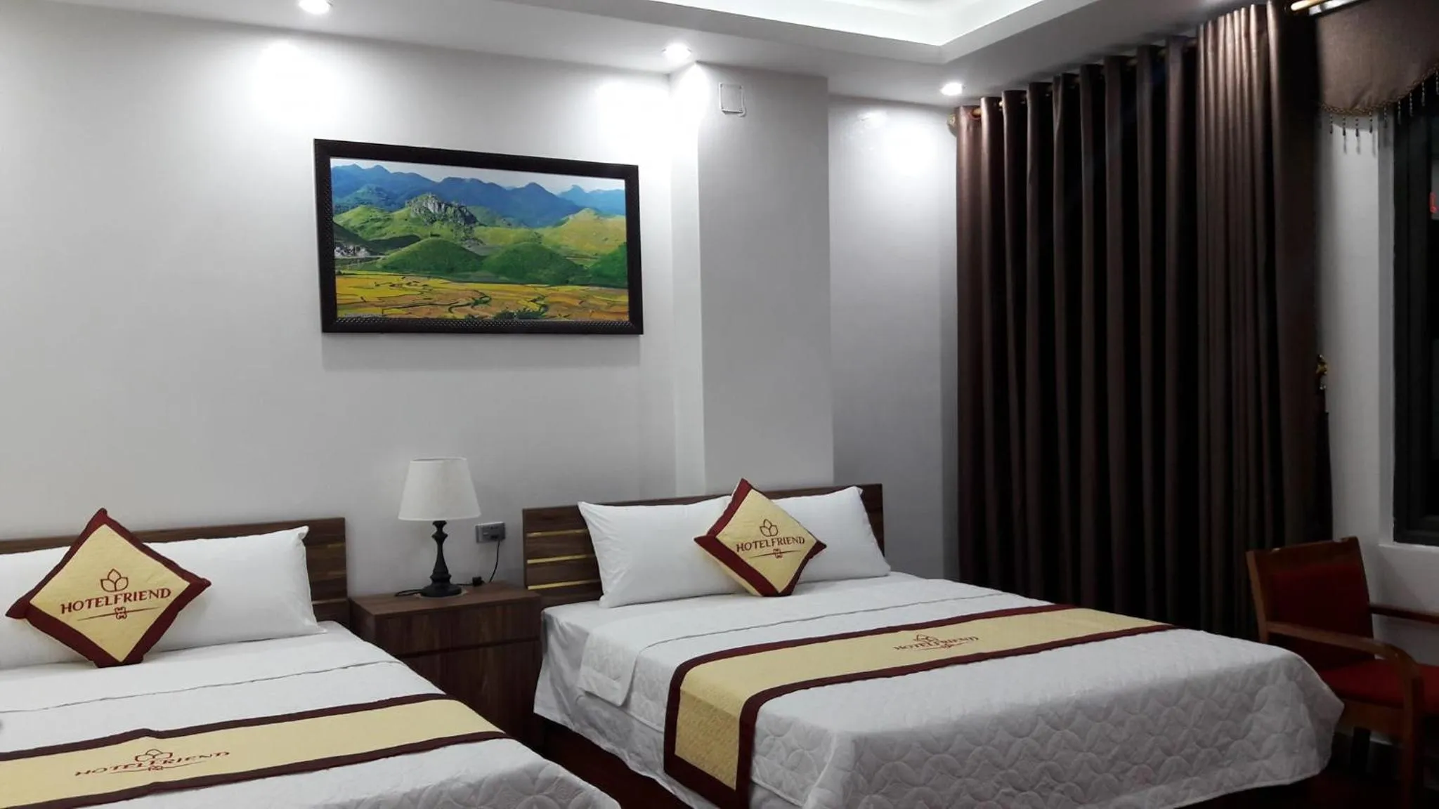 Communal lounge/ TV room, Bed in Friend Hotel Hà Giang