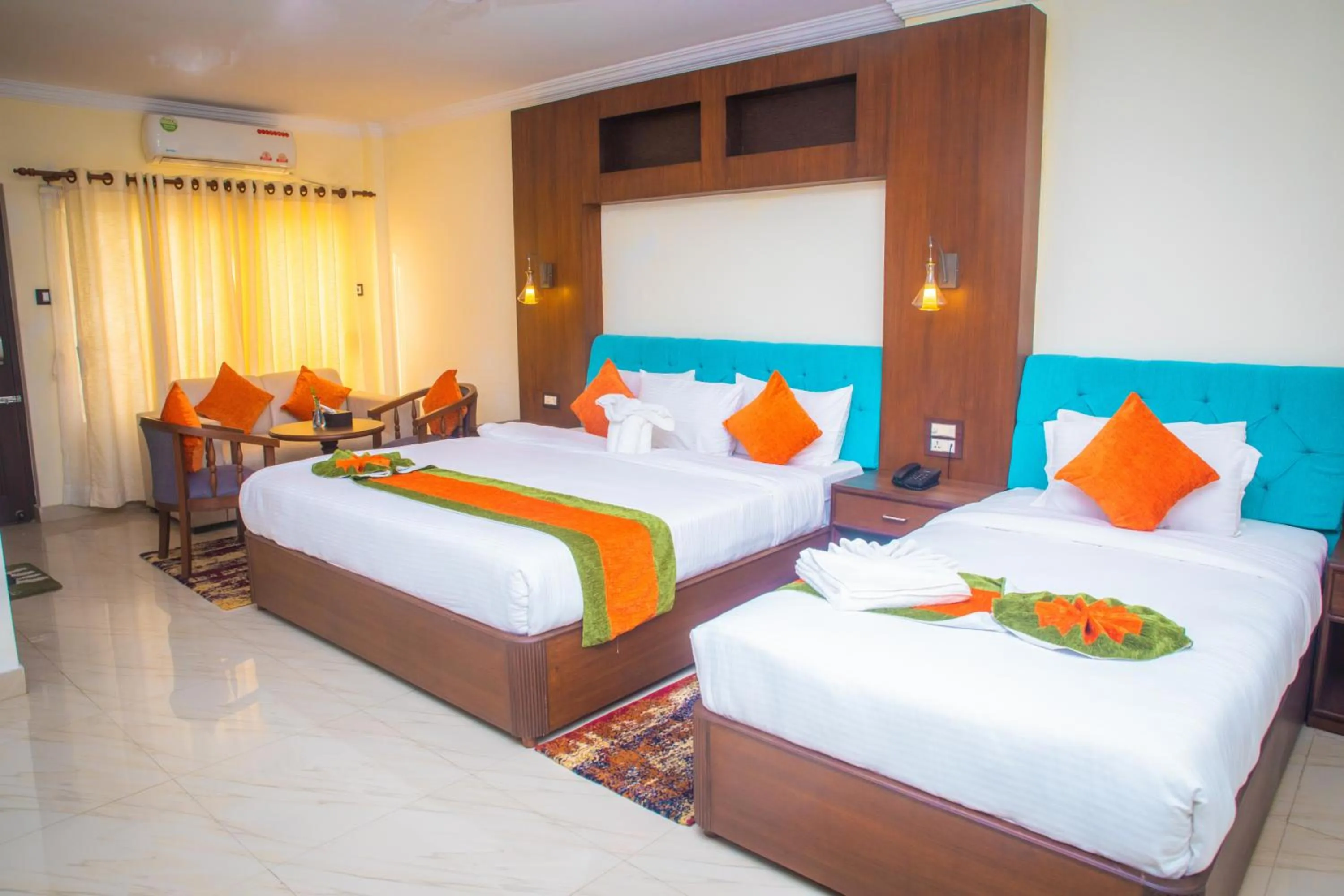 Bed in Gautam Buddha International Hotel