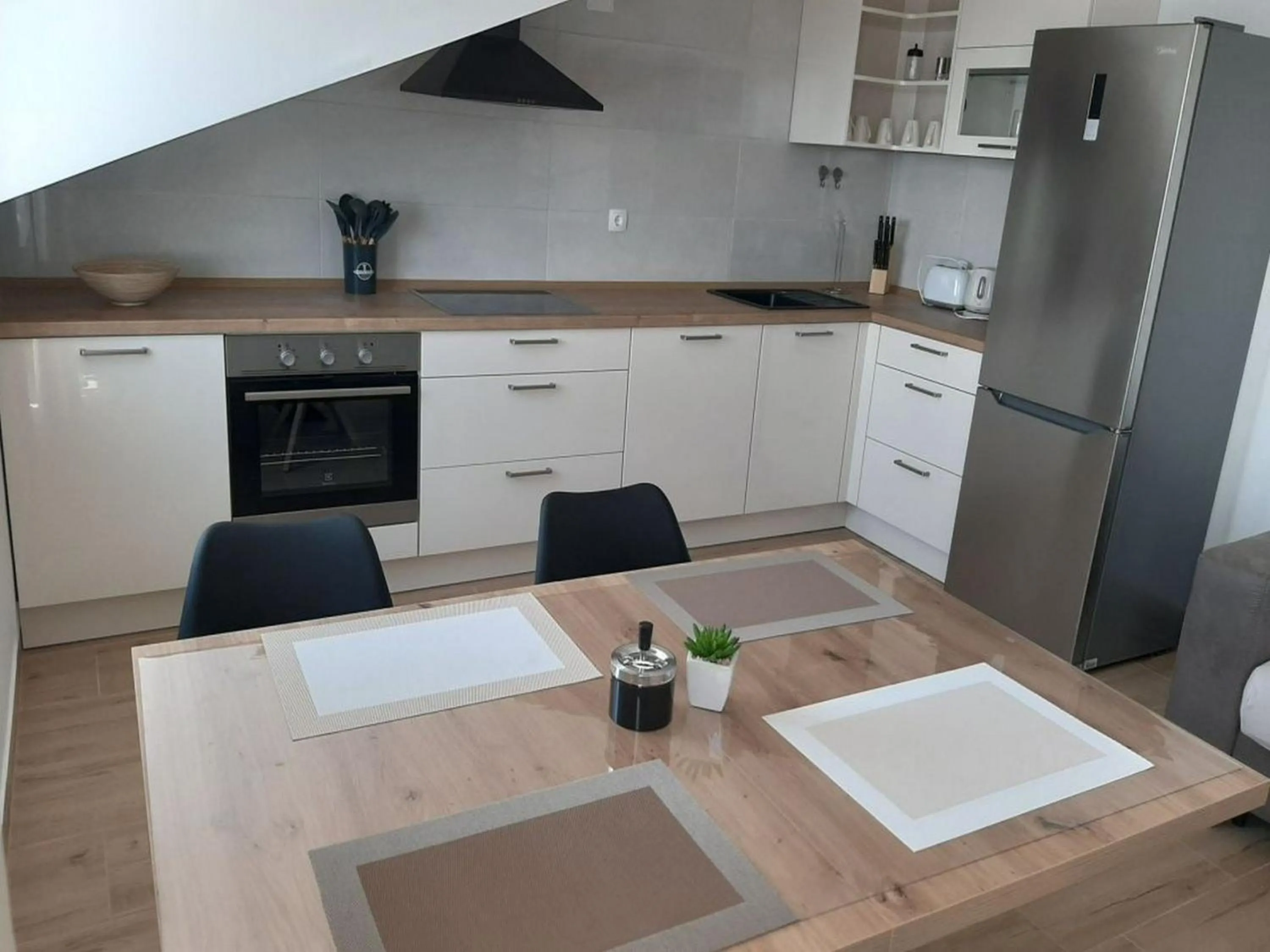 Kitchen or kitchenette in Apartments Dobrila