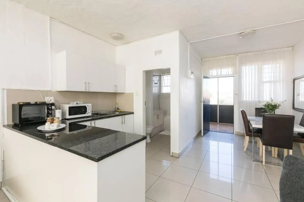 Kitchen or kitchenette in Inn & Out Sandton Park