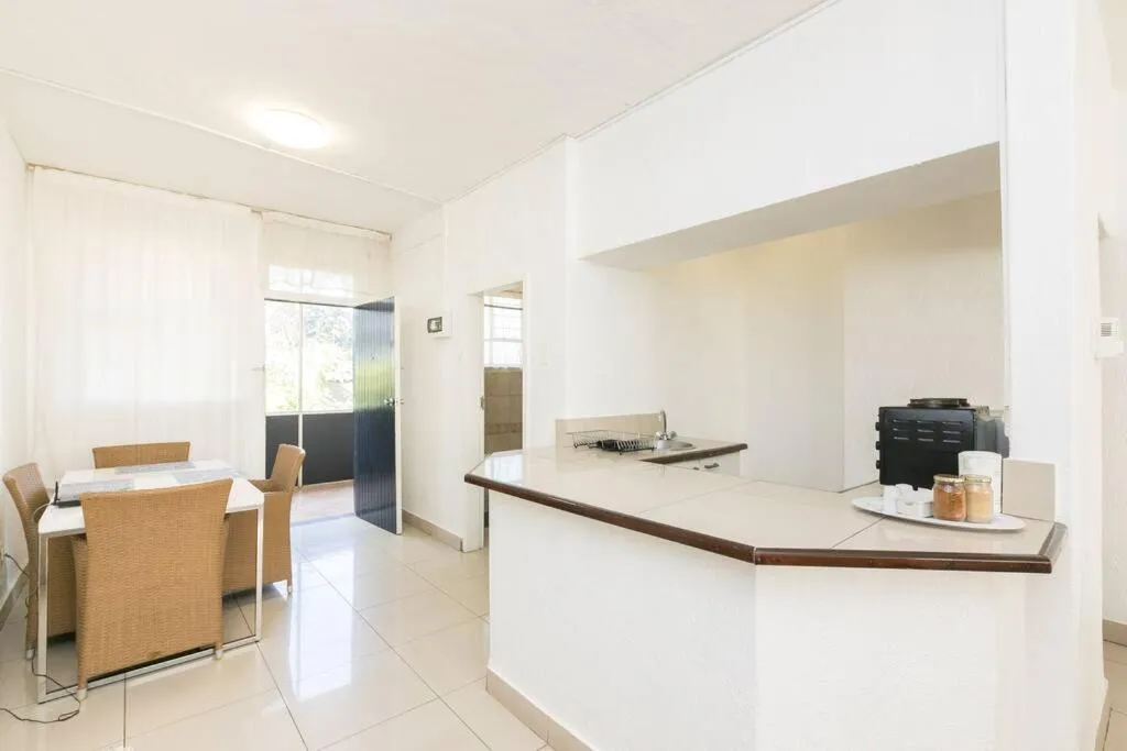 Kitchen or kitchenette in Inn & Out Sandton Park