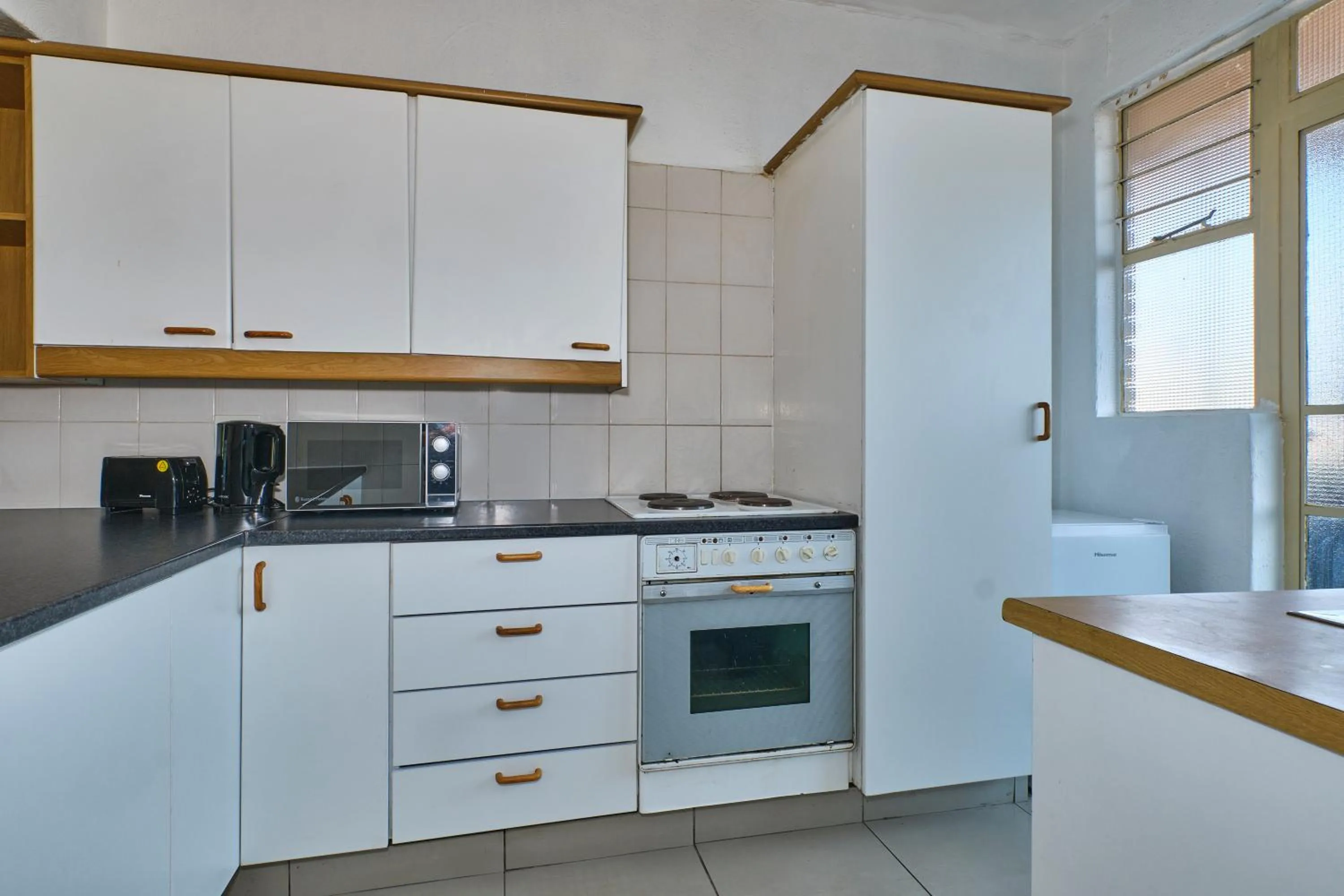Kitchen or kitchenette in Inn & Out Sandton Park