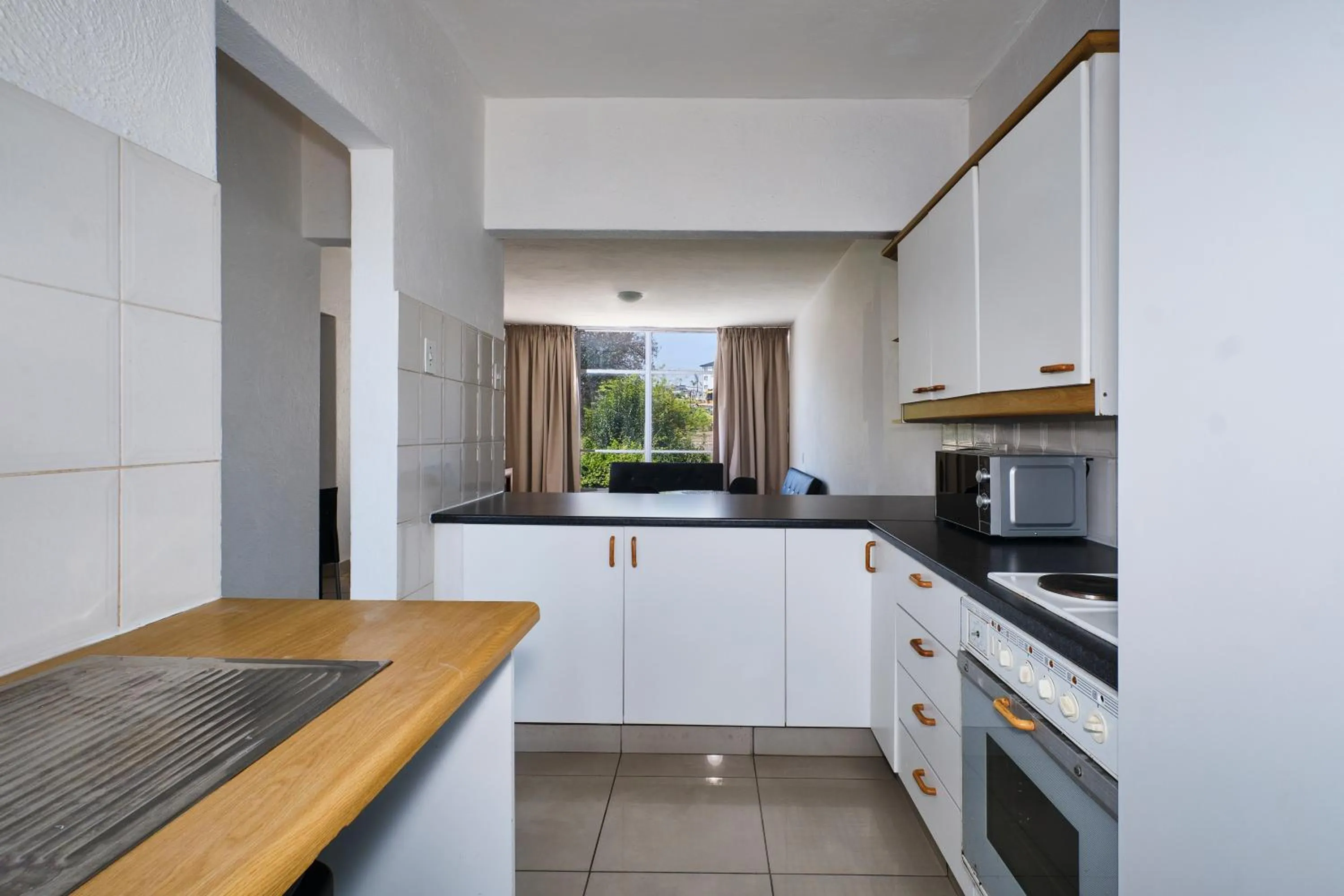 Kitchen or kitchenette in Inn & Out Sandton Park