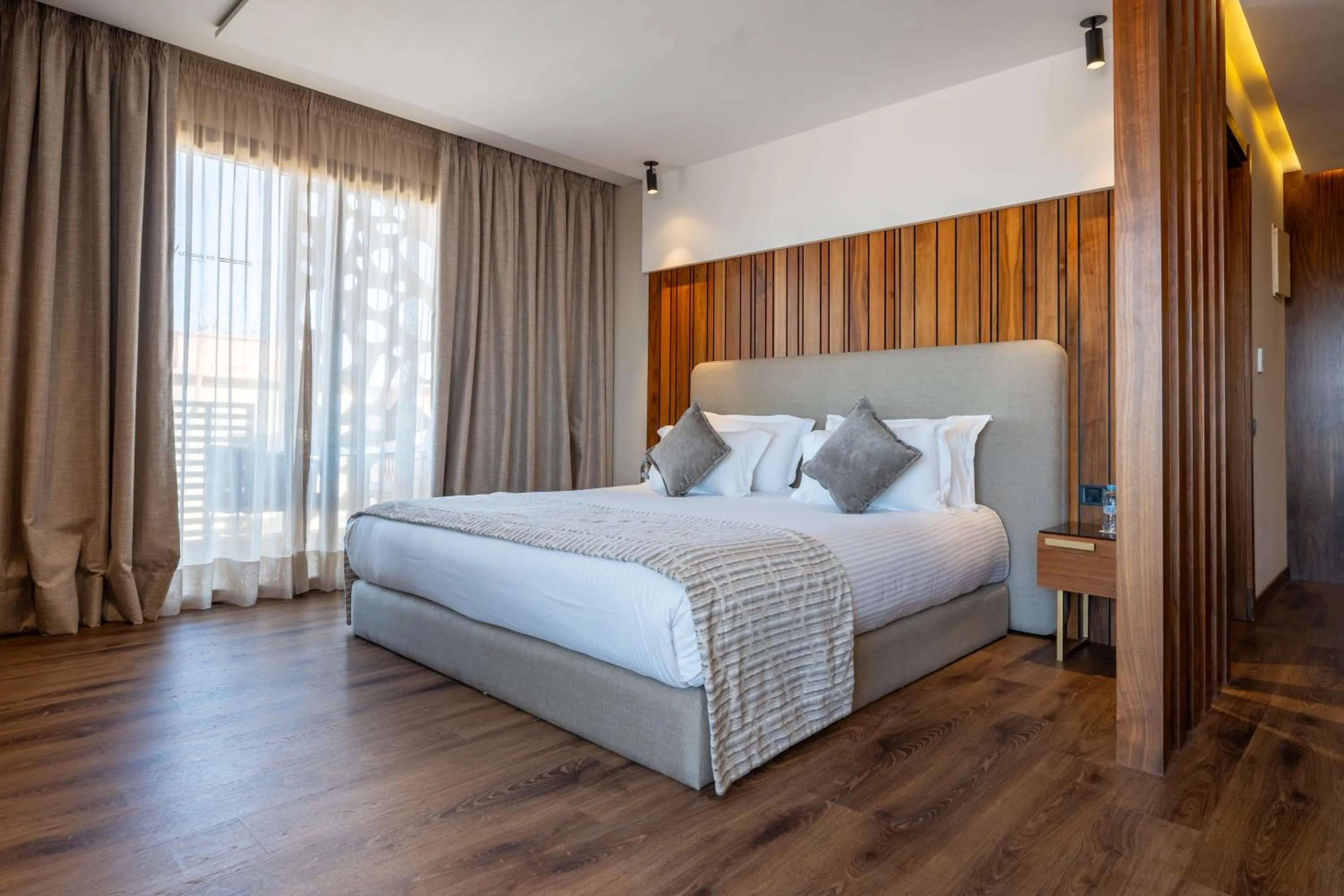 Bed in Longue vie Hotels