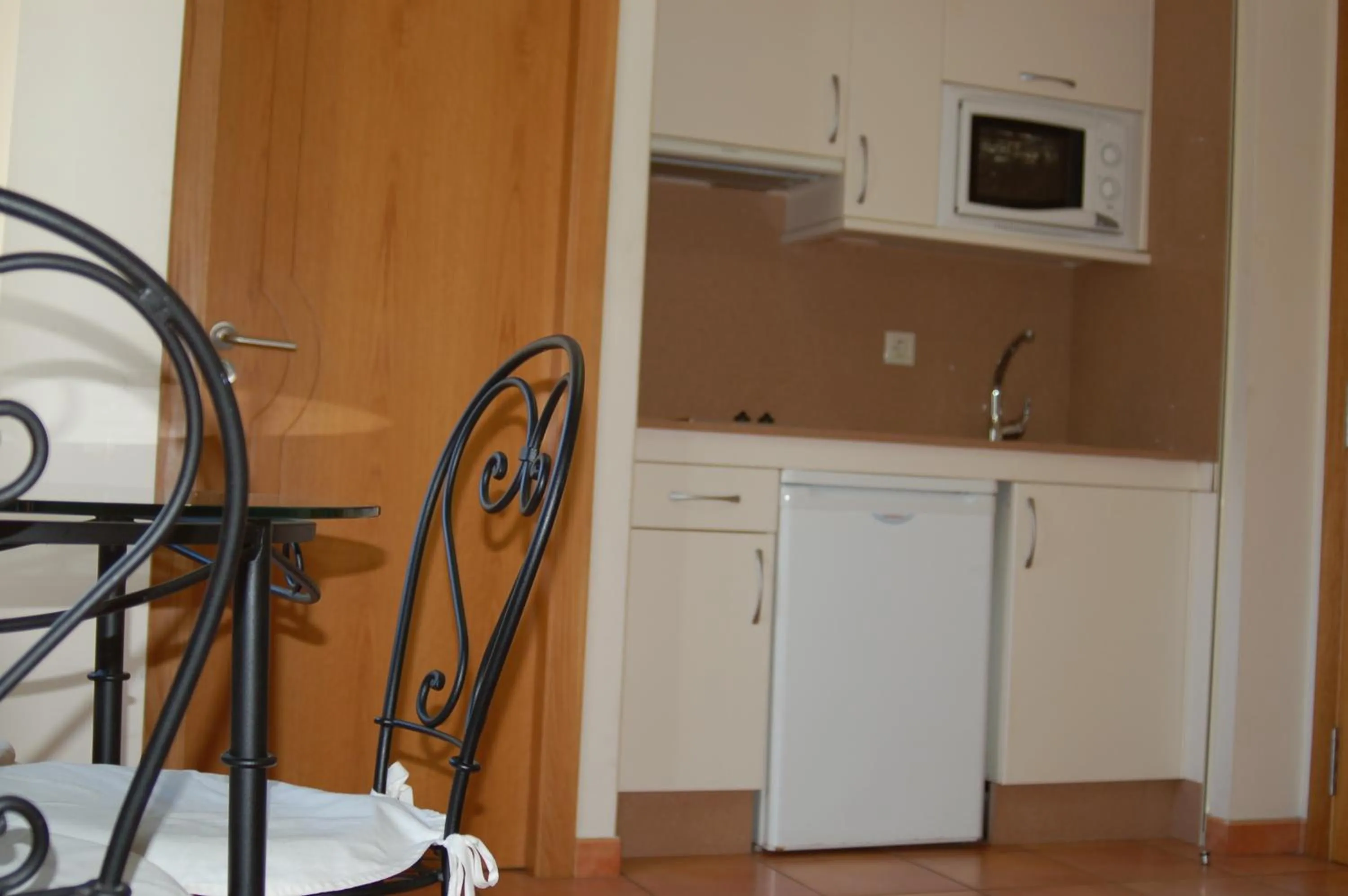 Kitchen or kitchenette in Apartamentos VIDA Sanxenxo