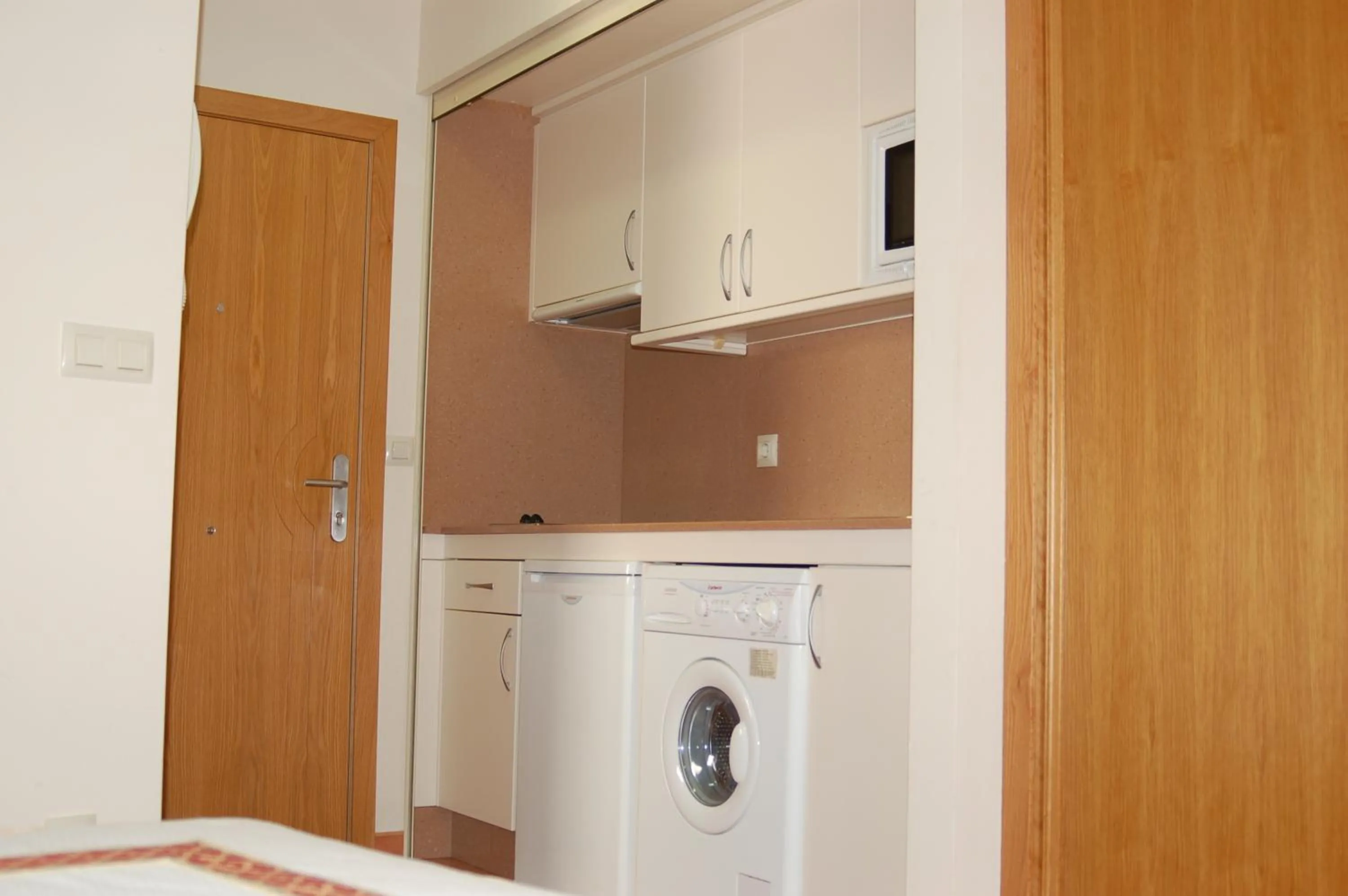 Kitchen or kitchenette in Apartamentos VIDA Sanxenxo