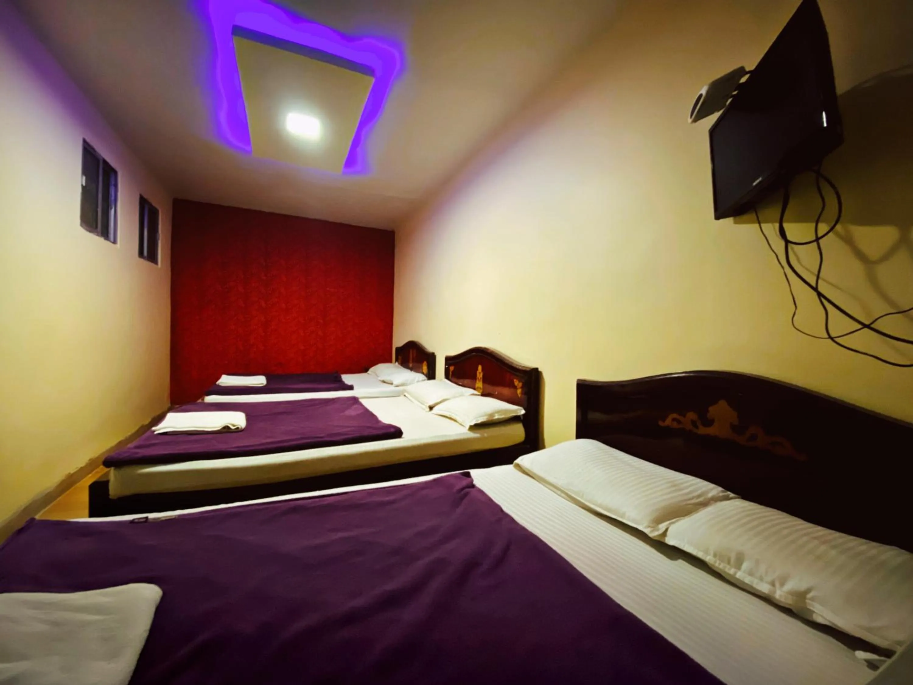 Bed in MAGIC MIST RESORT