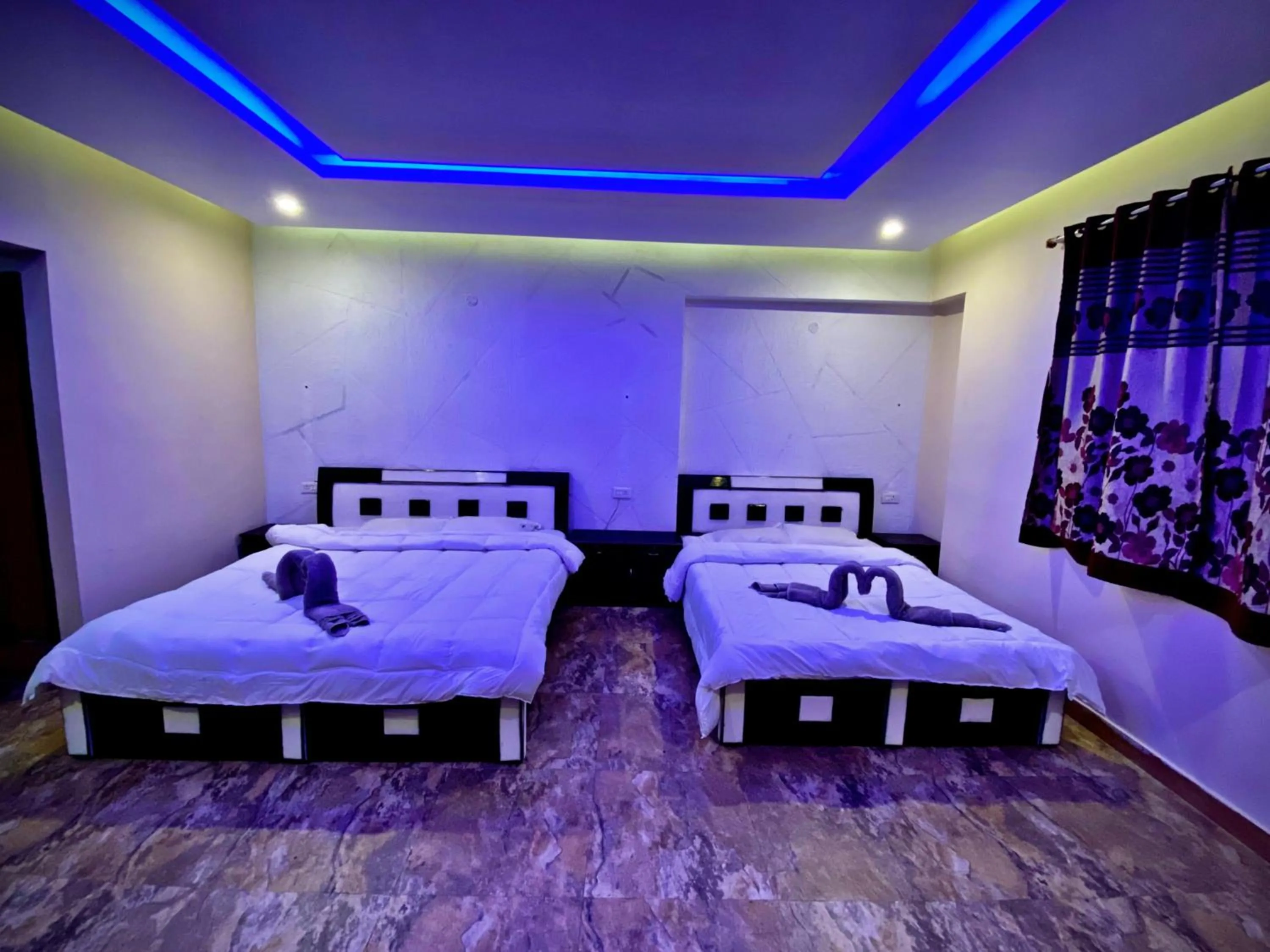 Bed in MAGIC MIST RESORT