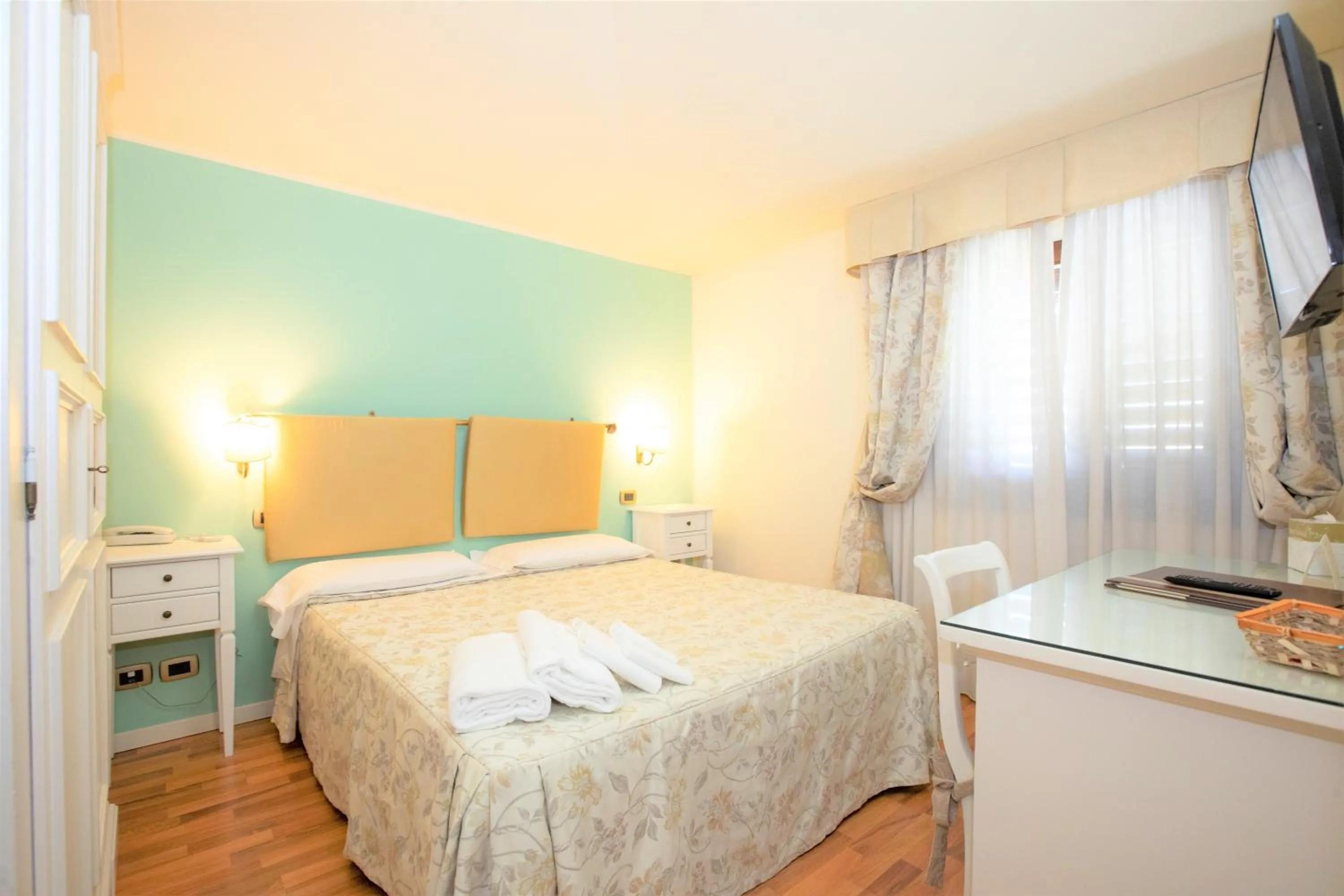 Bed in Hotel Arcobaleno Siena