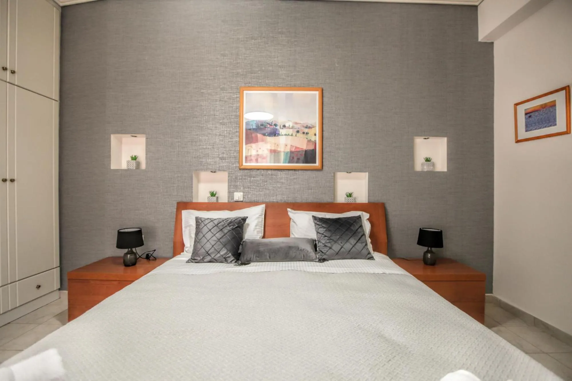 Bed in Grand Meteora Central Luxury Apartment