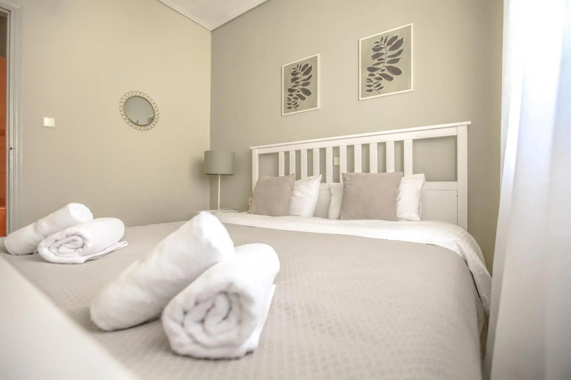 Bed in Grand Meteora Central Luxury Apartment