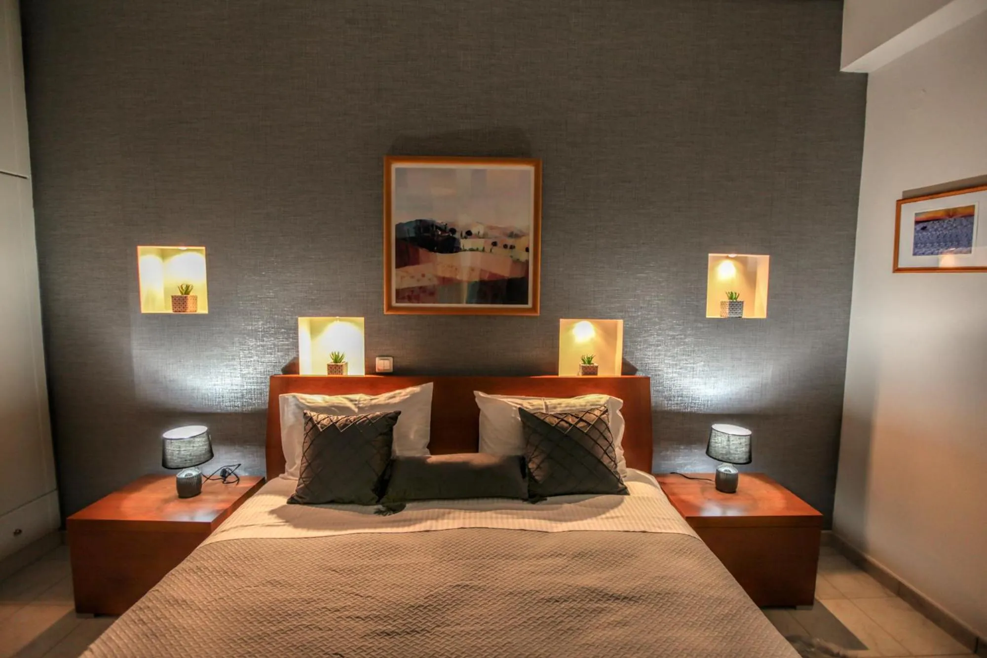 Bed in Grand Meteora Central Luxury Apartment