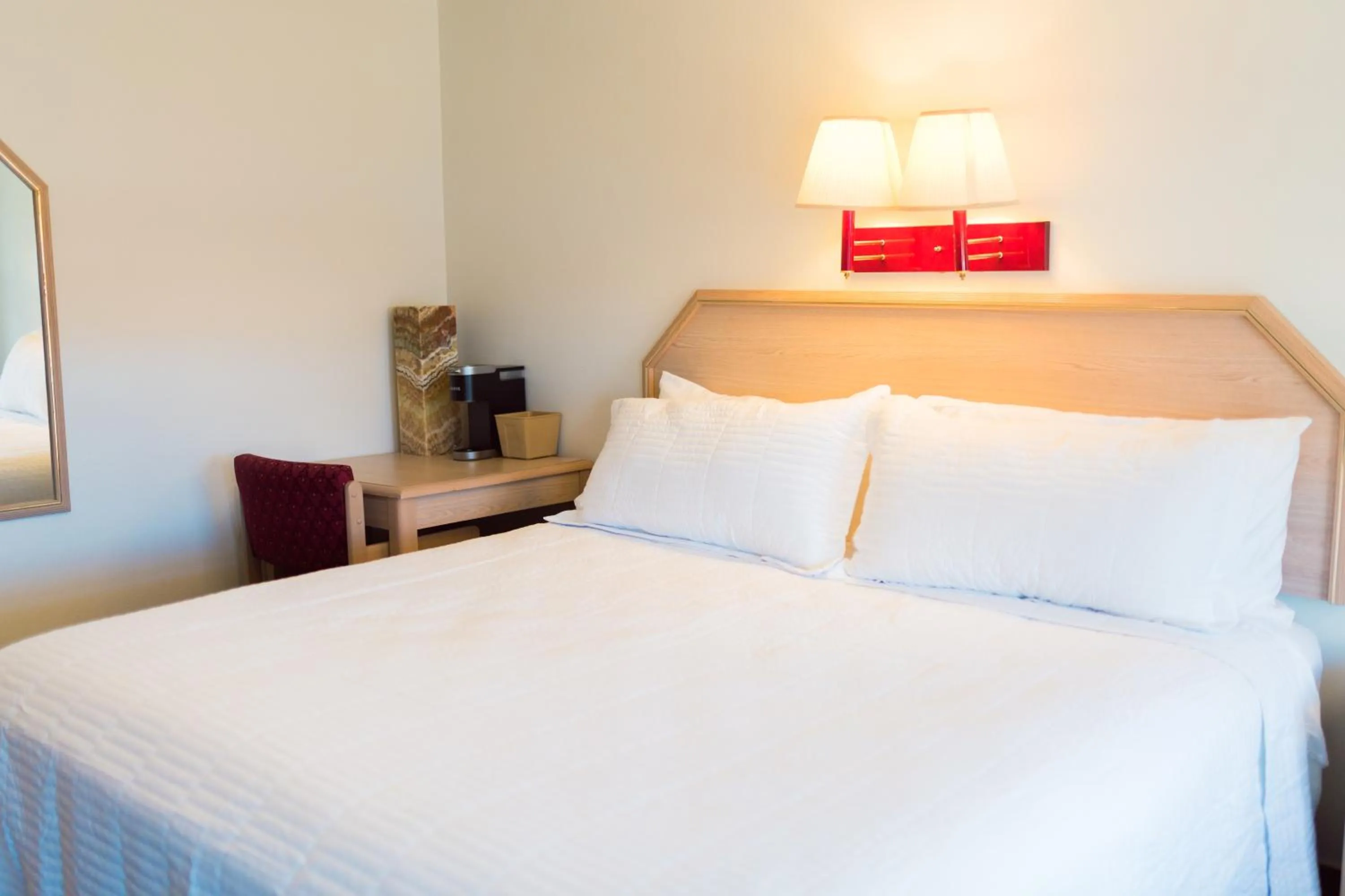 Bed in Two Sunsets Hotel