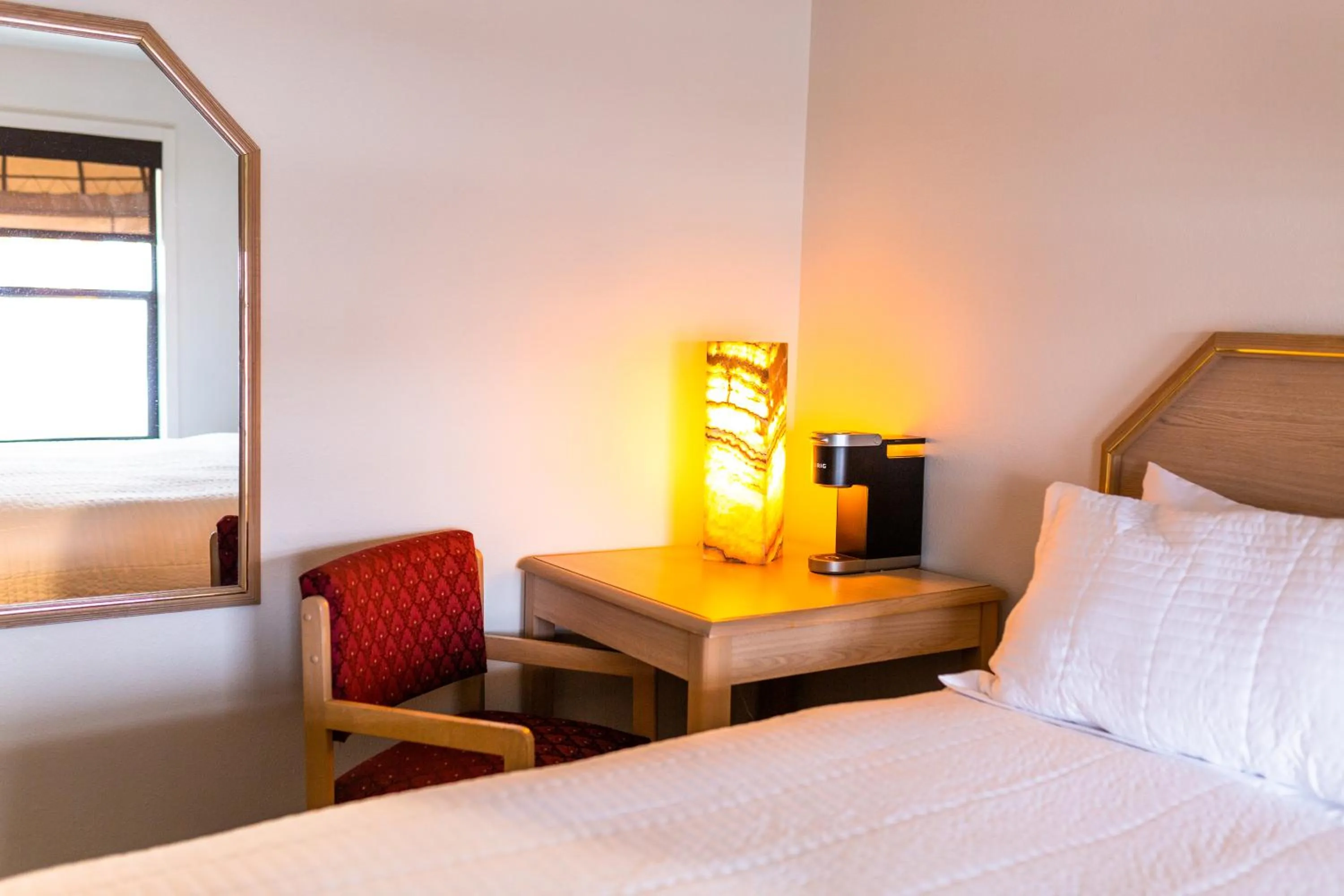 Bed in Two Sunsets Hotel