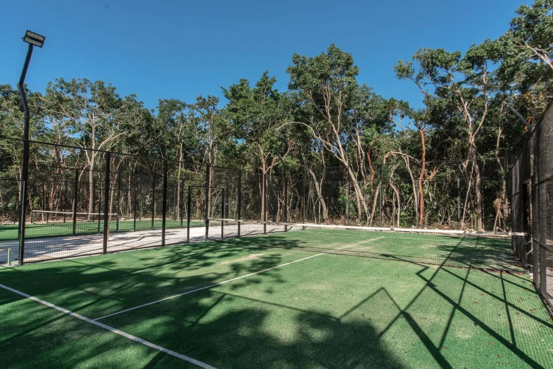 Tennis court in Lumina at LOSANTOS Tulum