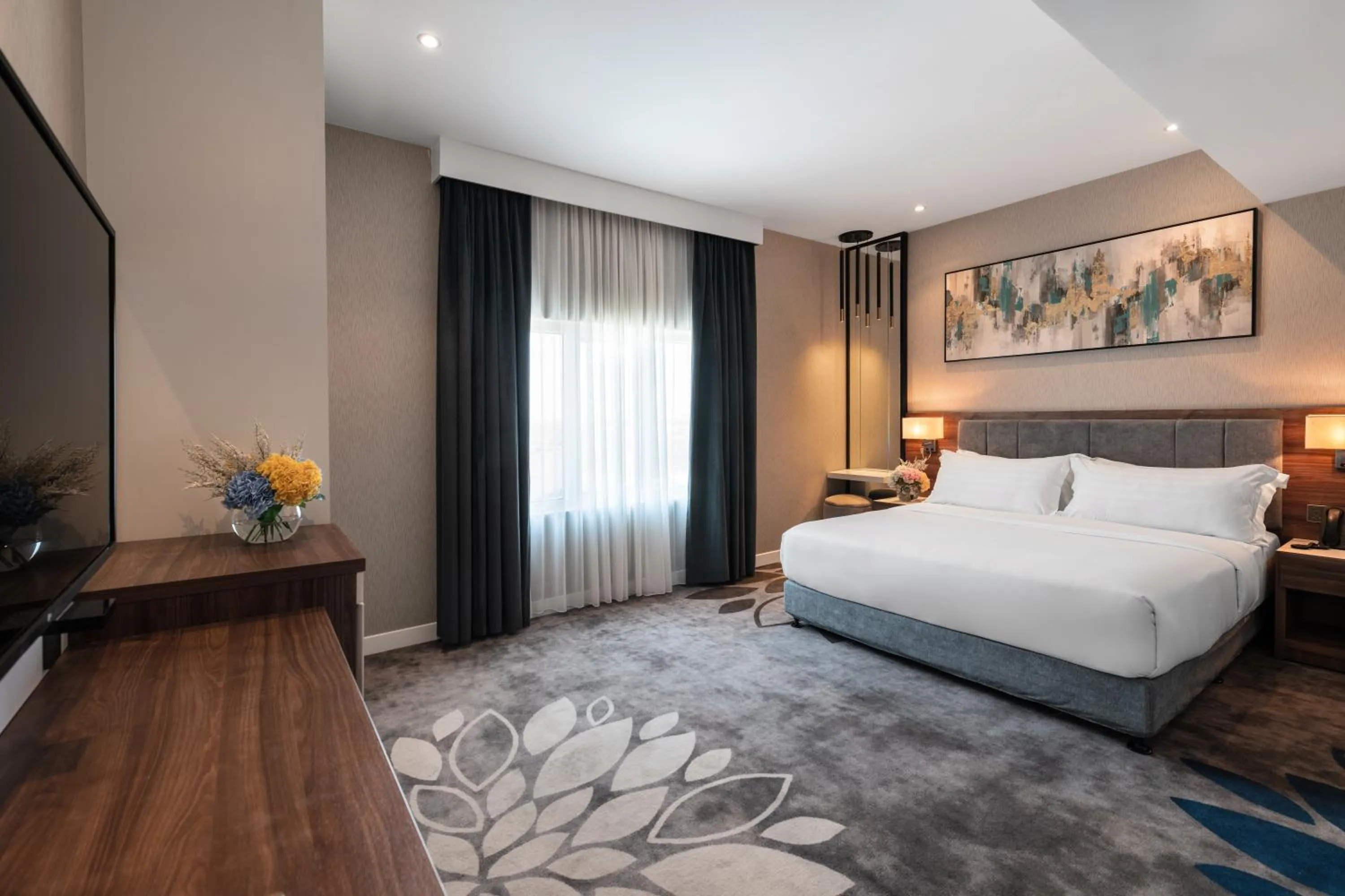 Bed in Warwick Al Jubail Hotel