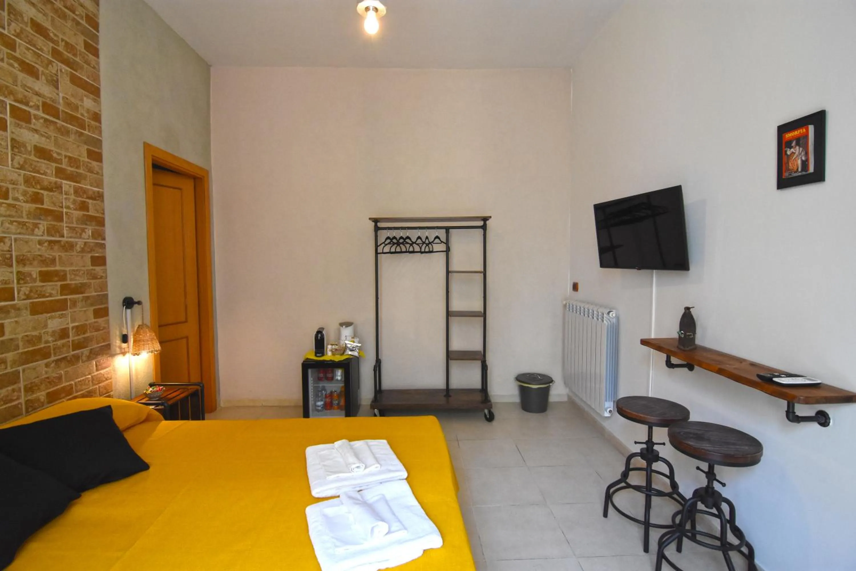 Photo of the whole room, Bed in Napoli Cityscape